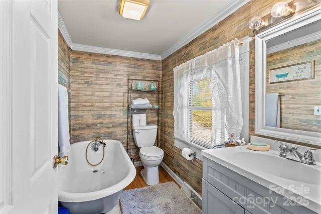 a bath room with a sink and a mirror
