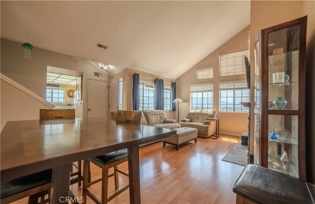 a view of a living room and dining room