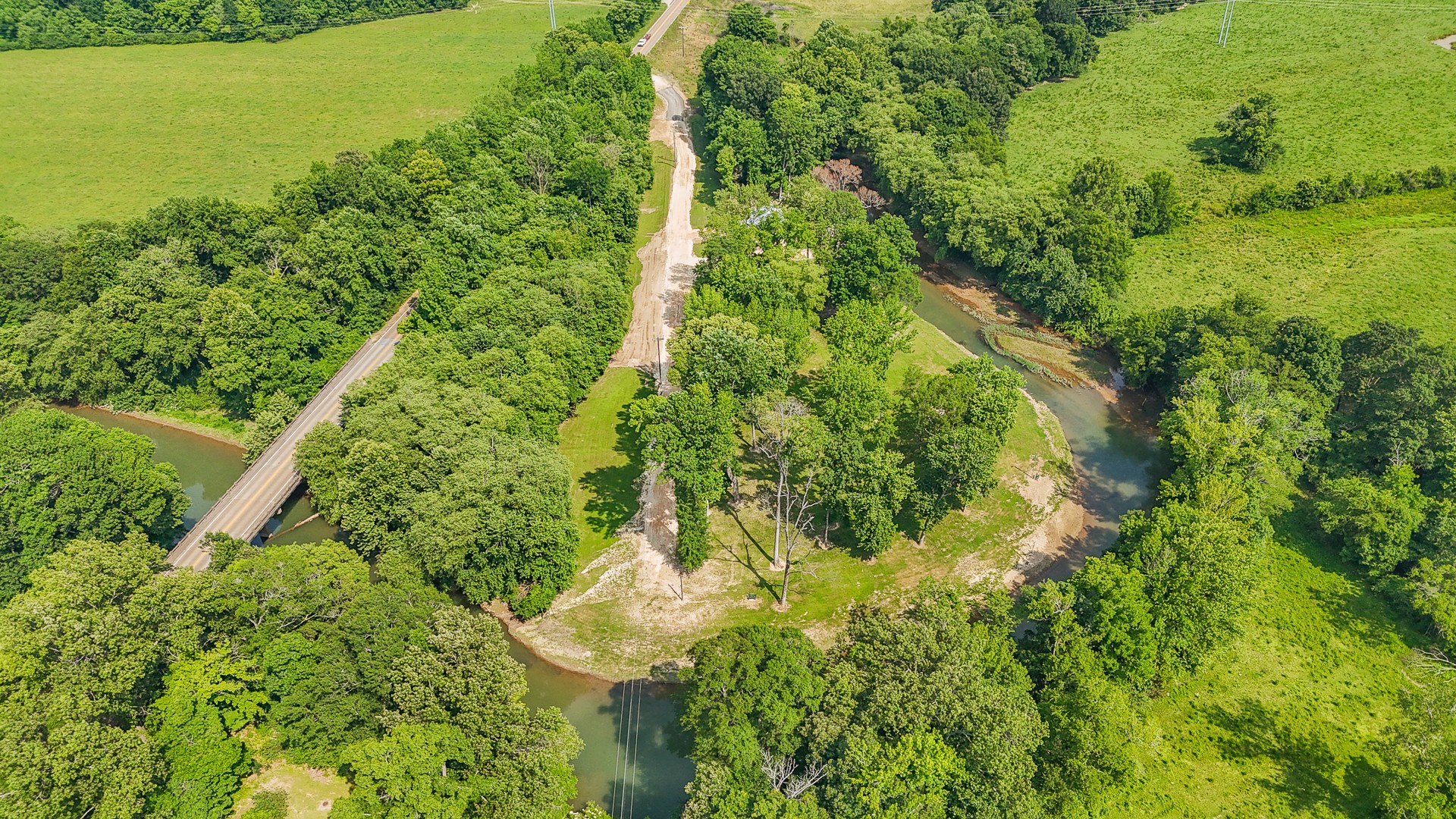 1820 Pinhook Road Savannah, TN 38372 - Photo 13 of 57 an aerial view of residential houses with outdoor space and trees all around