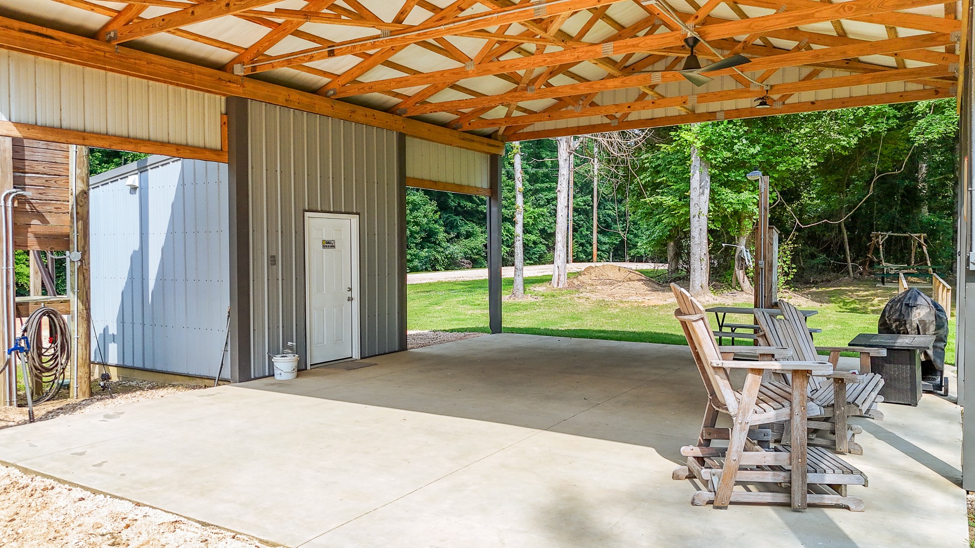 1820 Pinhook Road Savannah, TN 38372 - Photo 44 of 57 a patio with table and chairs and potted plants