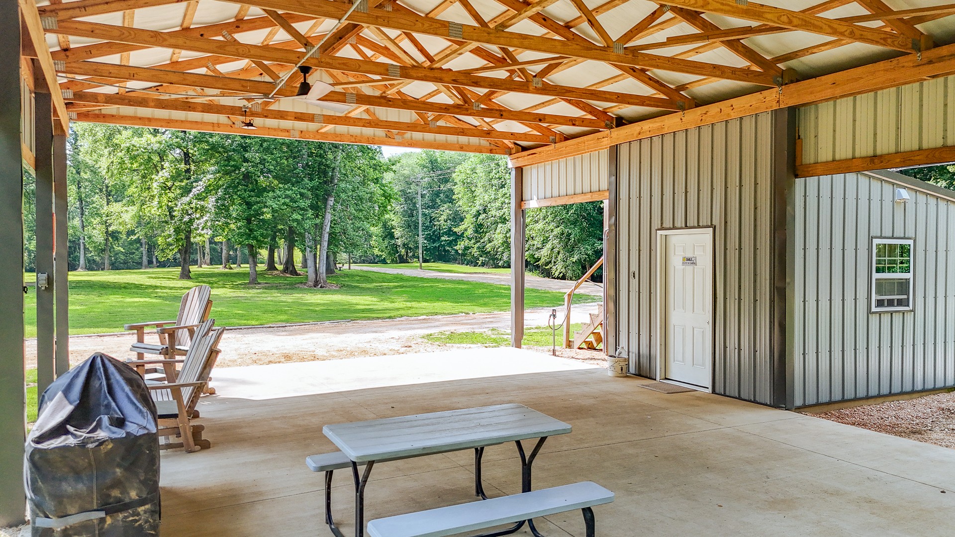 1820 Pinhook Road Savannah, TN 38372 - Photo 47 of 57 a view of a porch with furniture and garden