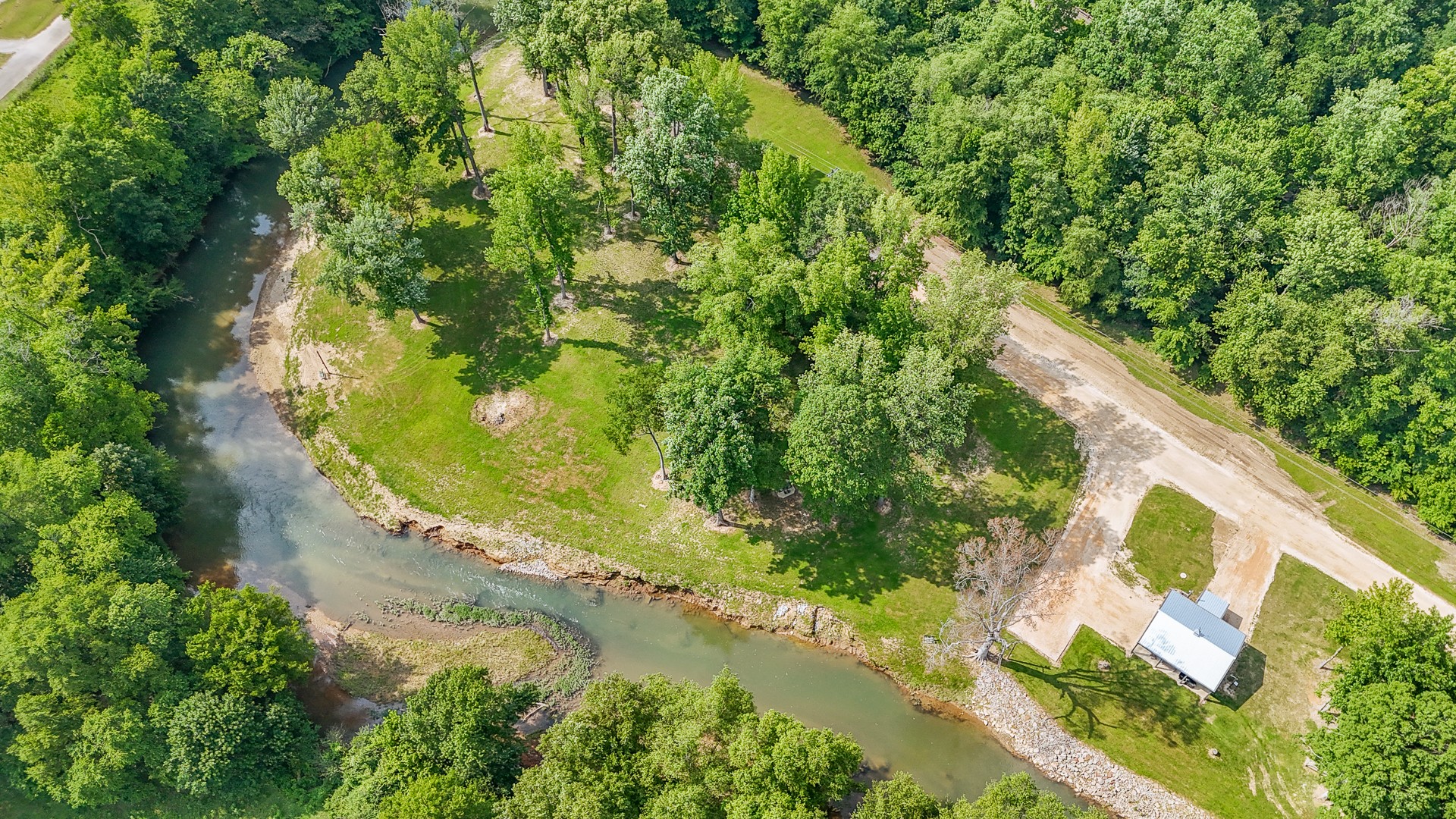 1820 Pinhook Road Savannah, TN 38372 - Photo 54 of 57 an aerial view of residential house with outdoor space and trees all around