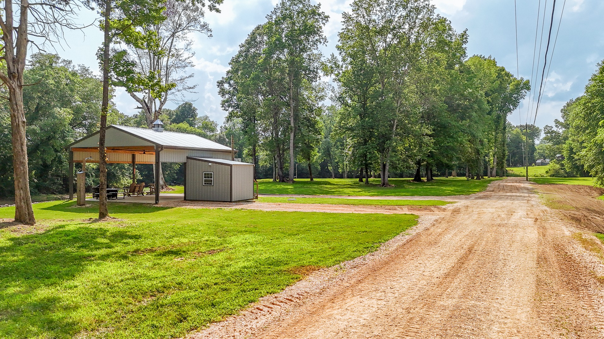 1820 Pinhook Road Savannah, TN 38372 - Photo 56 of 57 a front view of a house with swimming pool having outdoor seating