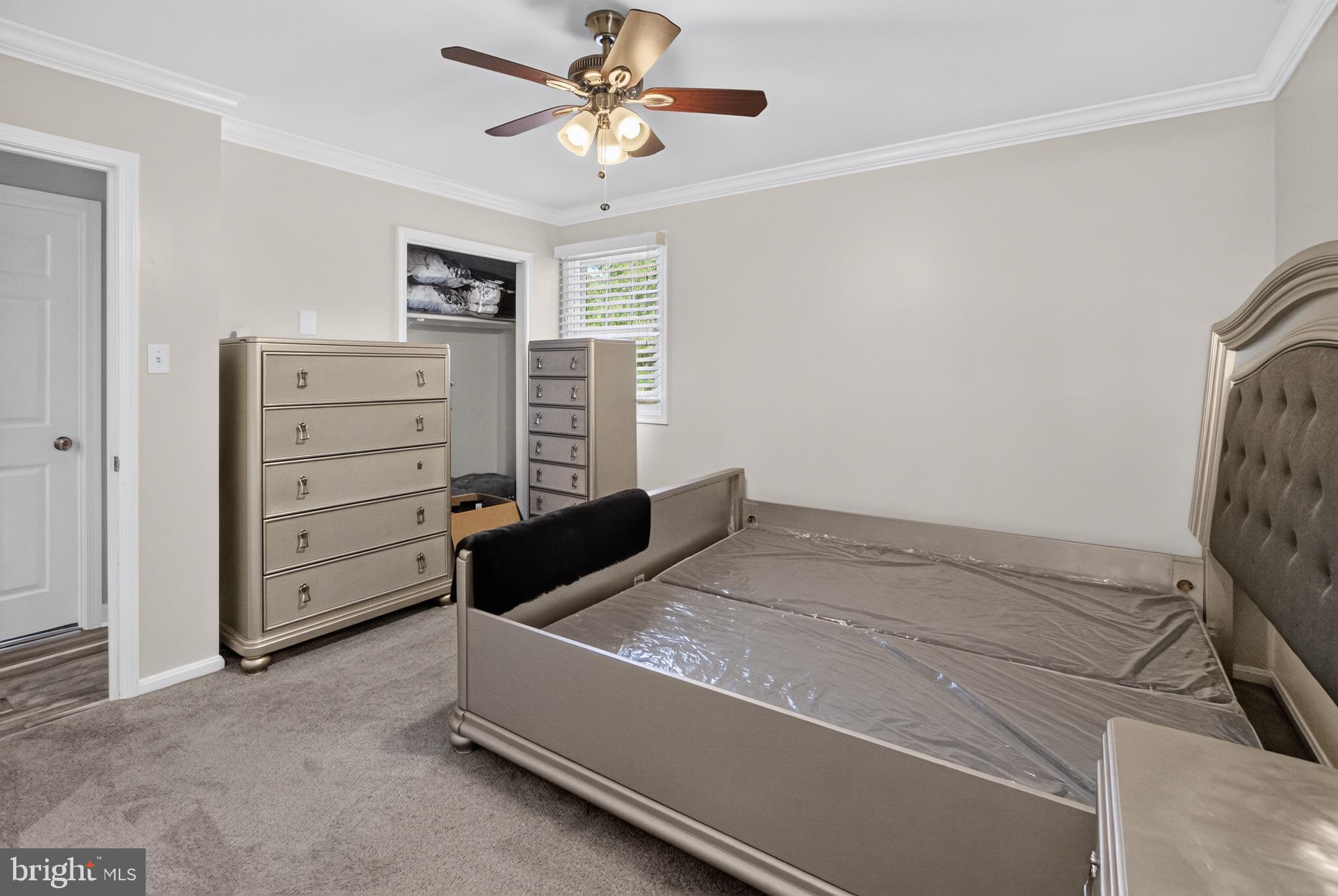 2816 Ridge Road Waldorf, MD 20603 - Photo 17 of 33 Serene bedroom with modern elegance.