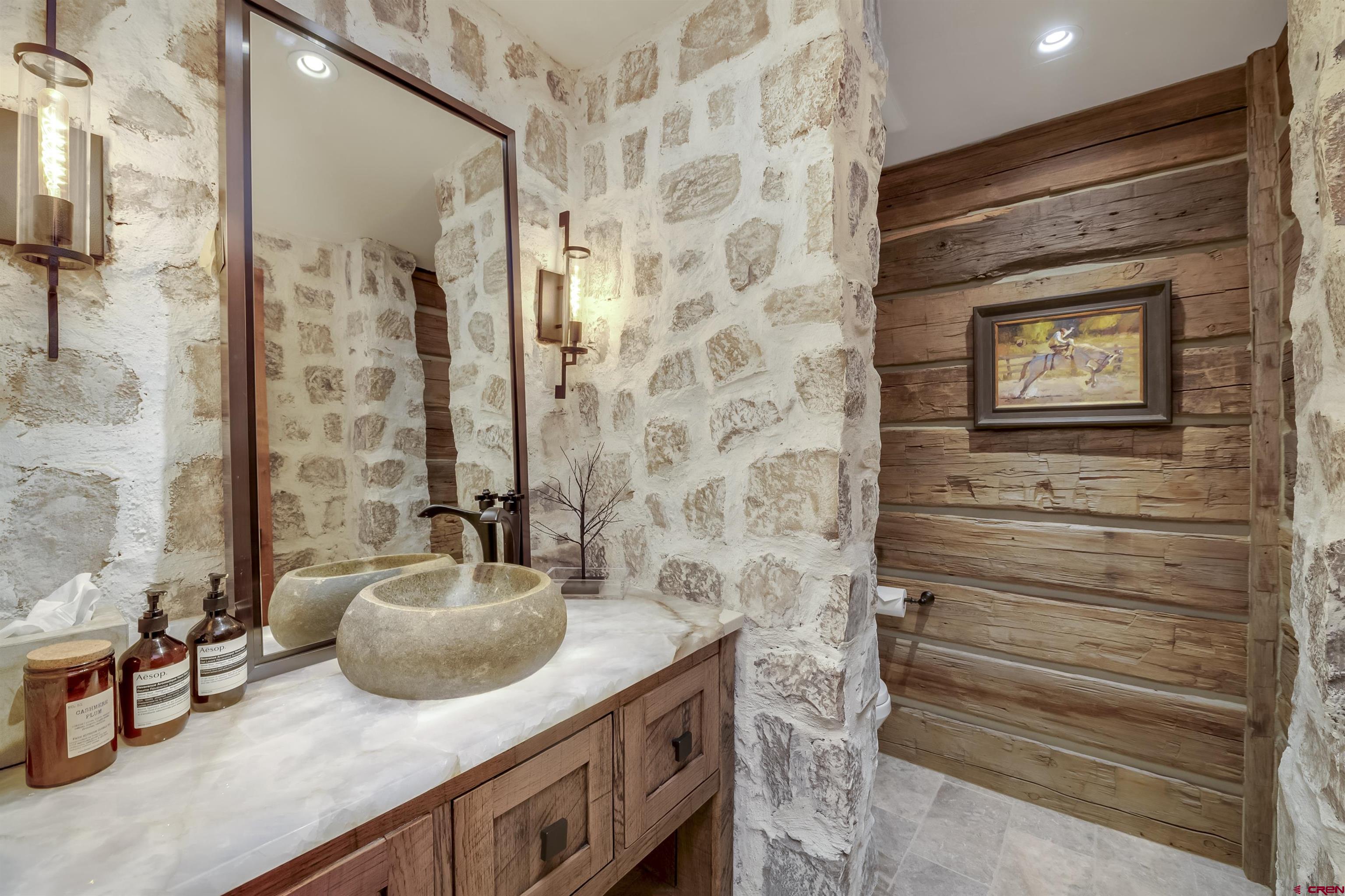 14 Hunter Hill Road, Unit C205 Crested Butte, CO 81225 - Photo 14 of 33 a bathroom with a sink and a mirror