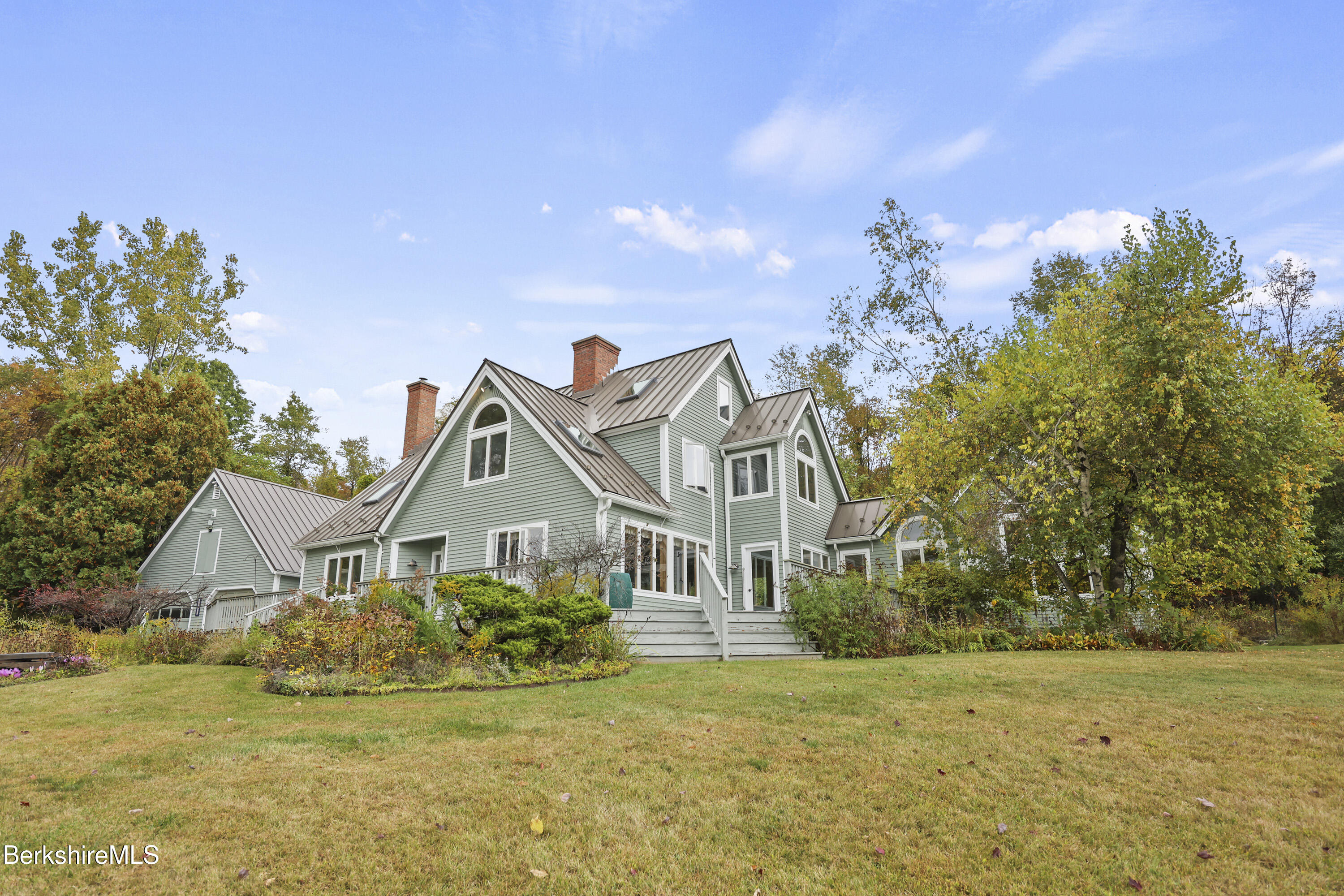 1030 Simonds Road Williamstown, MA 01267 - Photo 71 of 76 a front view of a house with a big yard