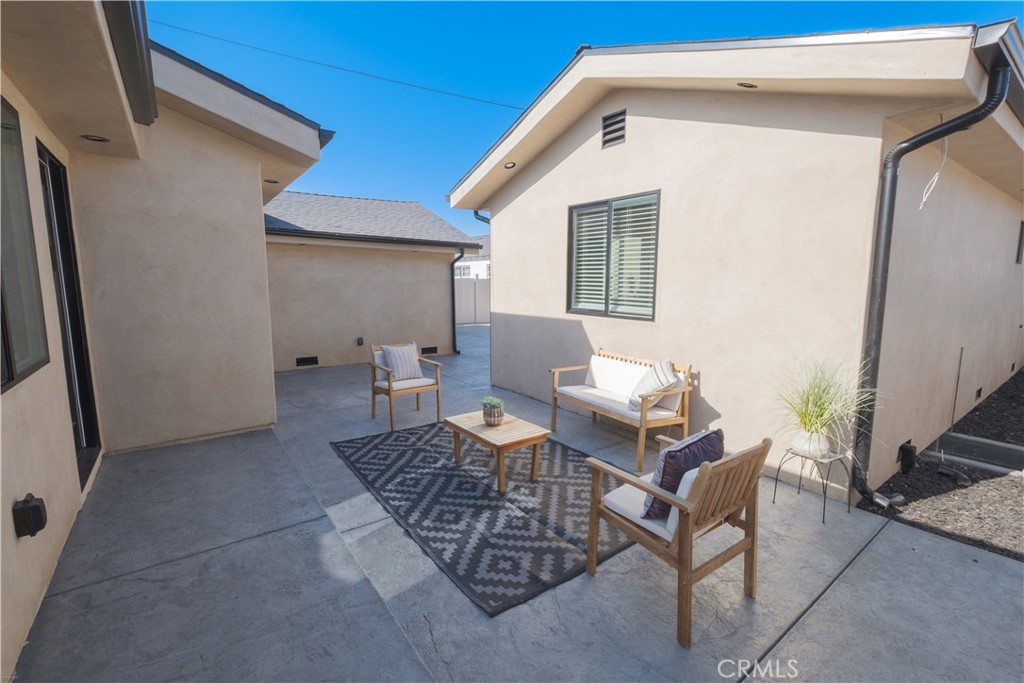 223 South Aprilia Avenue Compton, CA 90220 - Photo 29 of 46 a outdoor space with patio furniture