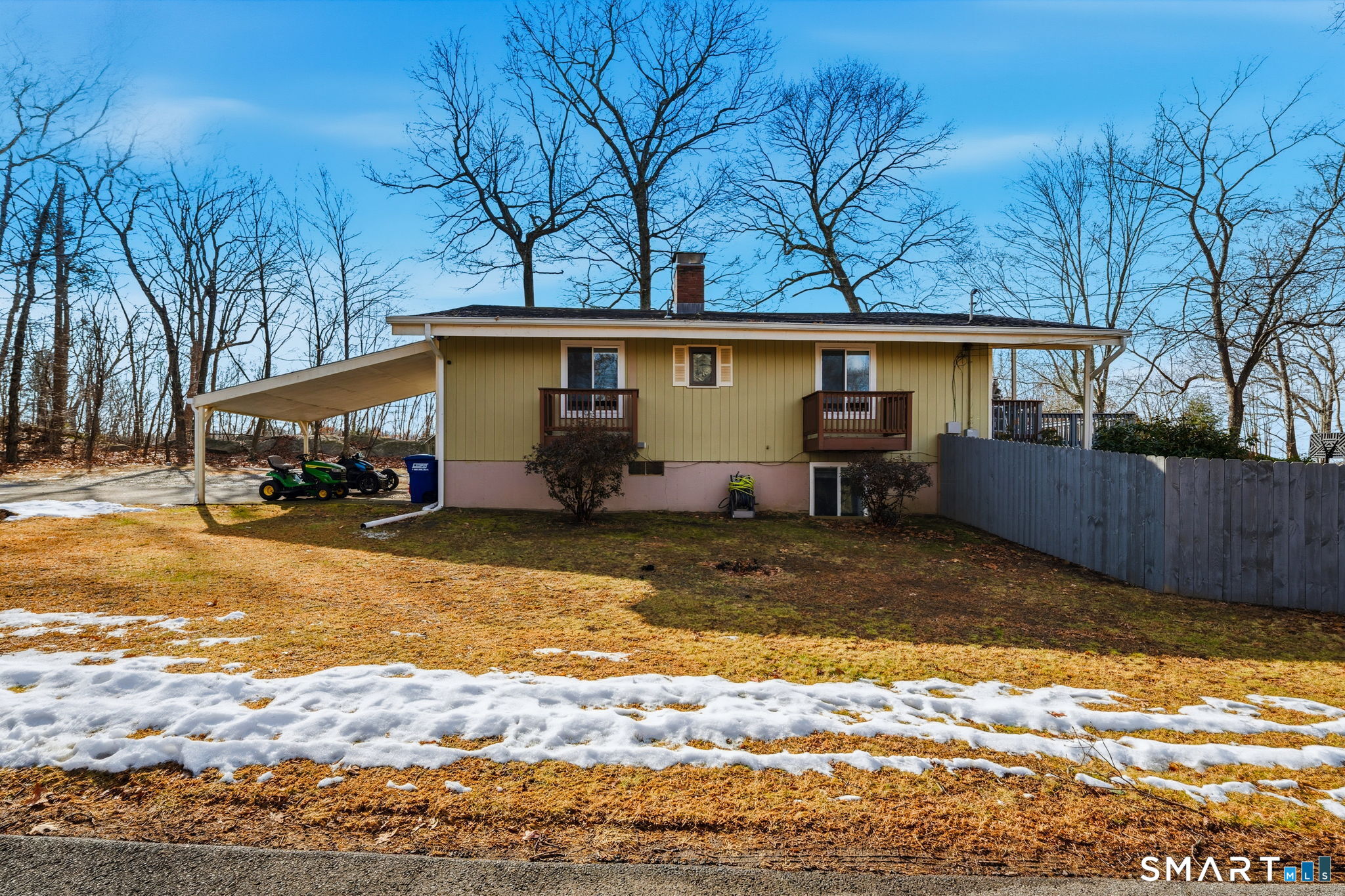 39 Inchcliffe Drive Ledyard, CT 06335 - Photo 18 of 40 a view of a house with snow on the background