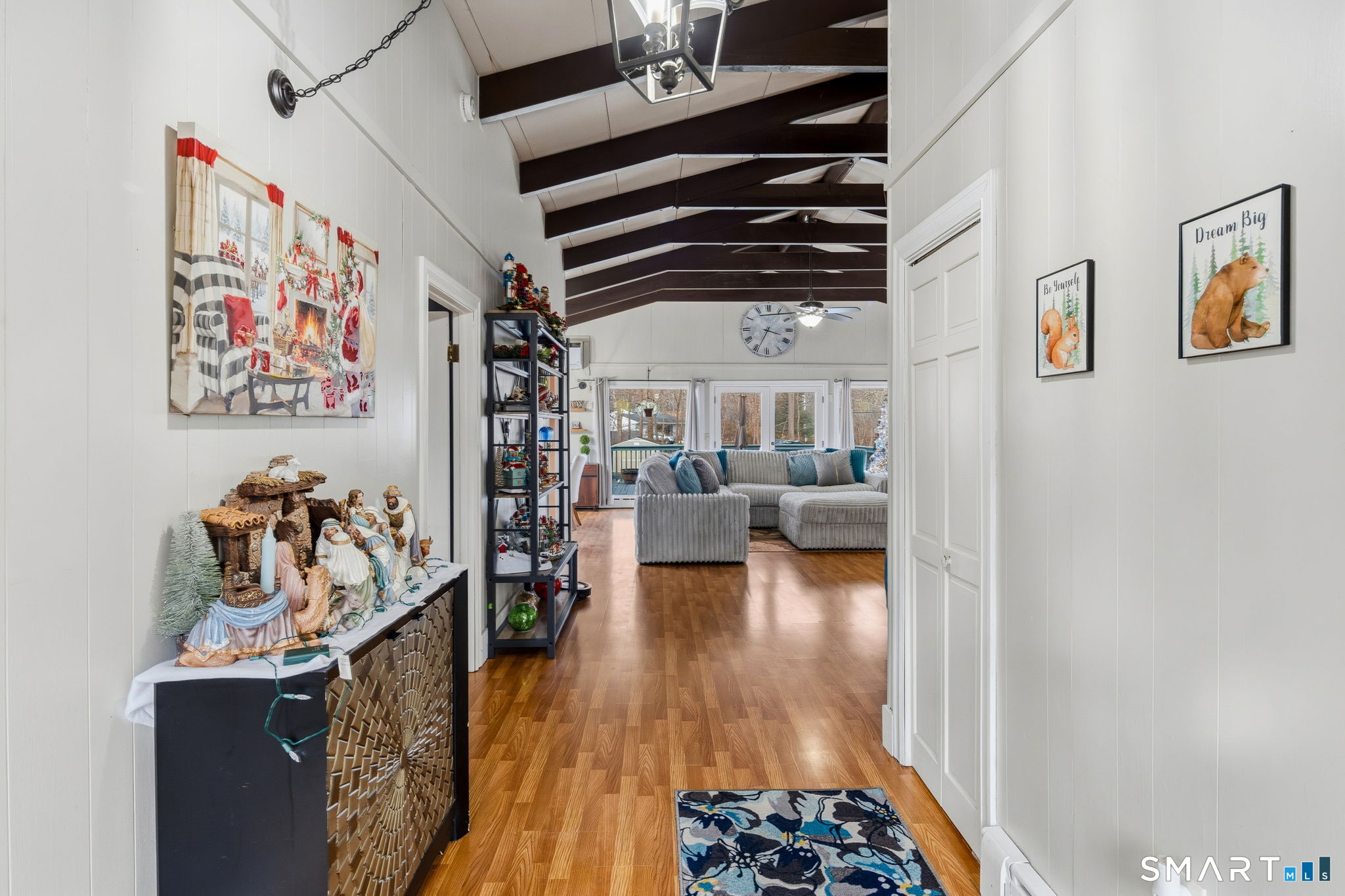 39 Inchcliffe Drive Ledyard, CT 06335 - Photo 23 of 40 a view of a livingroom with furniture wooden floor windows