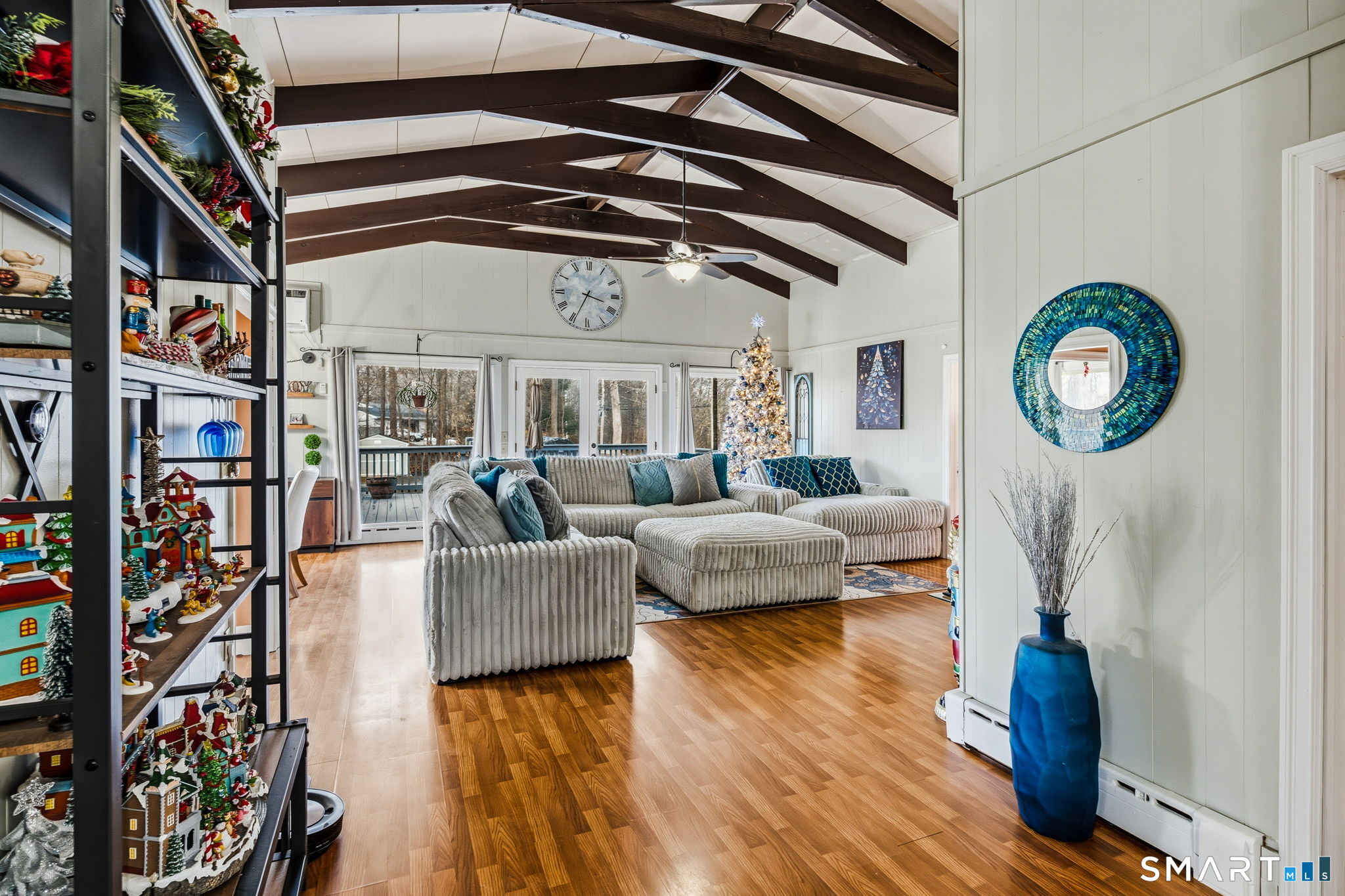 39 Inchcliffe Drive Ledyard, CT 06335 - Photo 24 of 40 a living room with furniture and a clock
