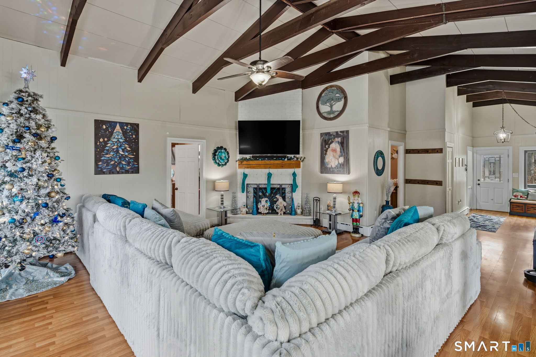 39 Inchcliffe Drive Ledyard, CT 06335 - Photo 25 of 40 a living room with furniture and a flat screen tv