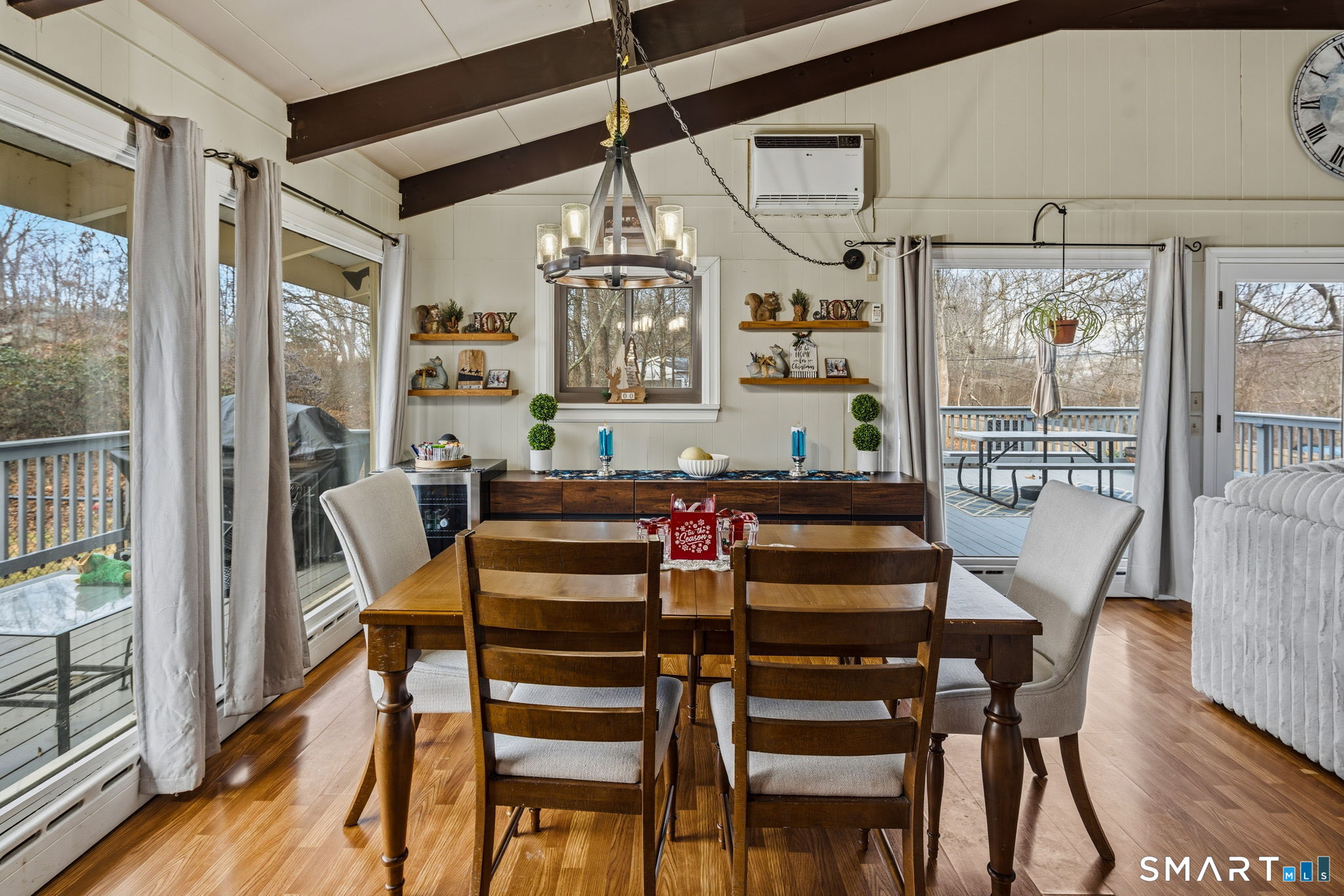 39 Inchcliffe Drive Ledyard, CT 06335 - Photo 27 of 40 a view of a dining room with furniture wooden floor and chandelier