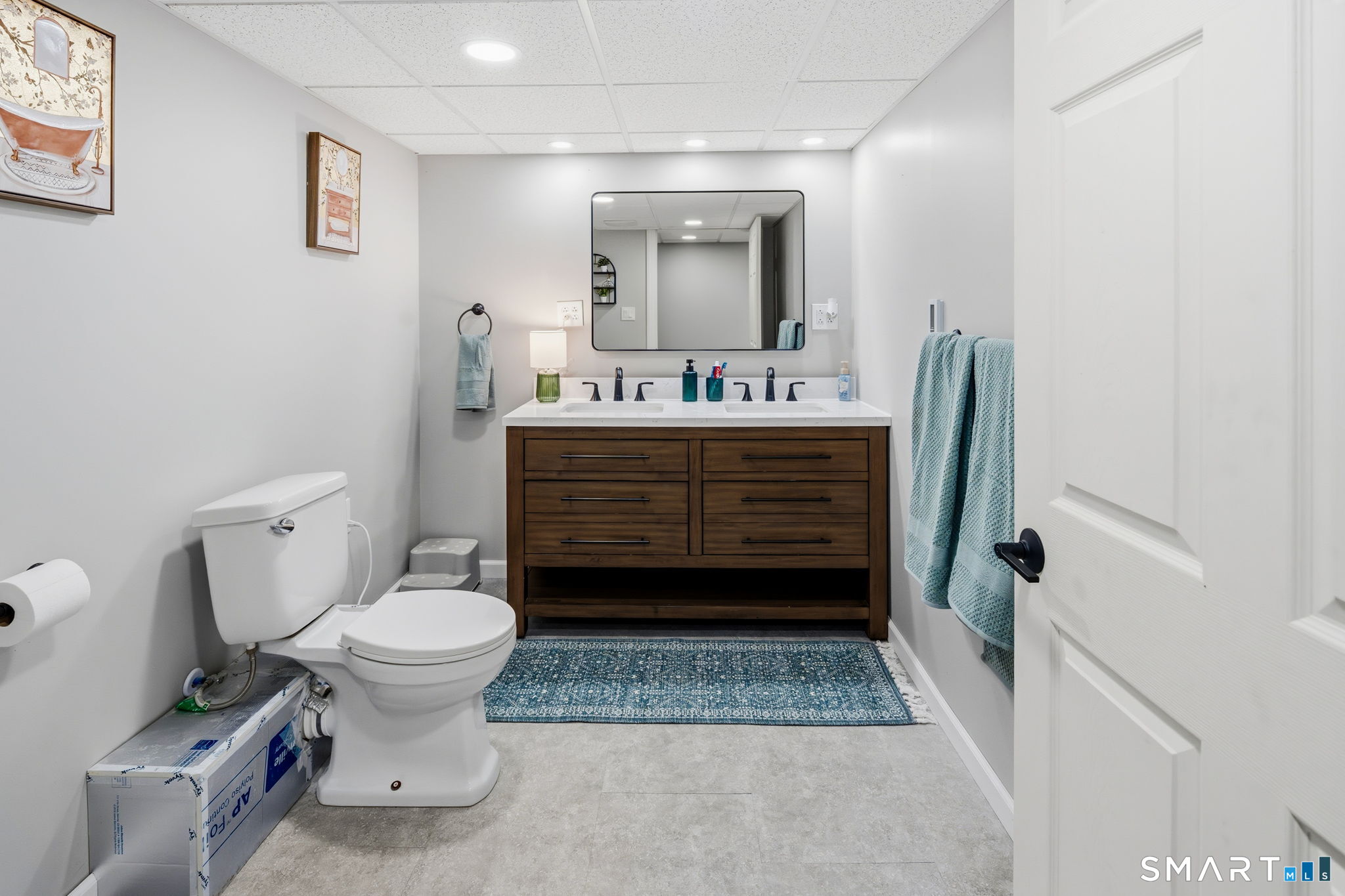 39 Inchcliffe Drive Ledyard, CT 06335 - Photo 38 of 40 a view of bathroom with a toilet sink and mirror