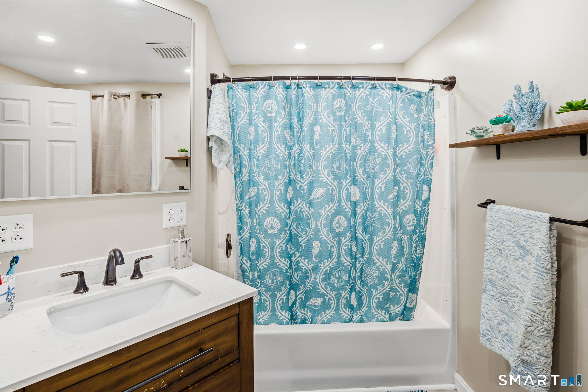 39 Inchcliffe Drive Ledyard, CT 06335 - Photo 6 of 40 a bathroom with a sink a toilet and a mirror