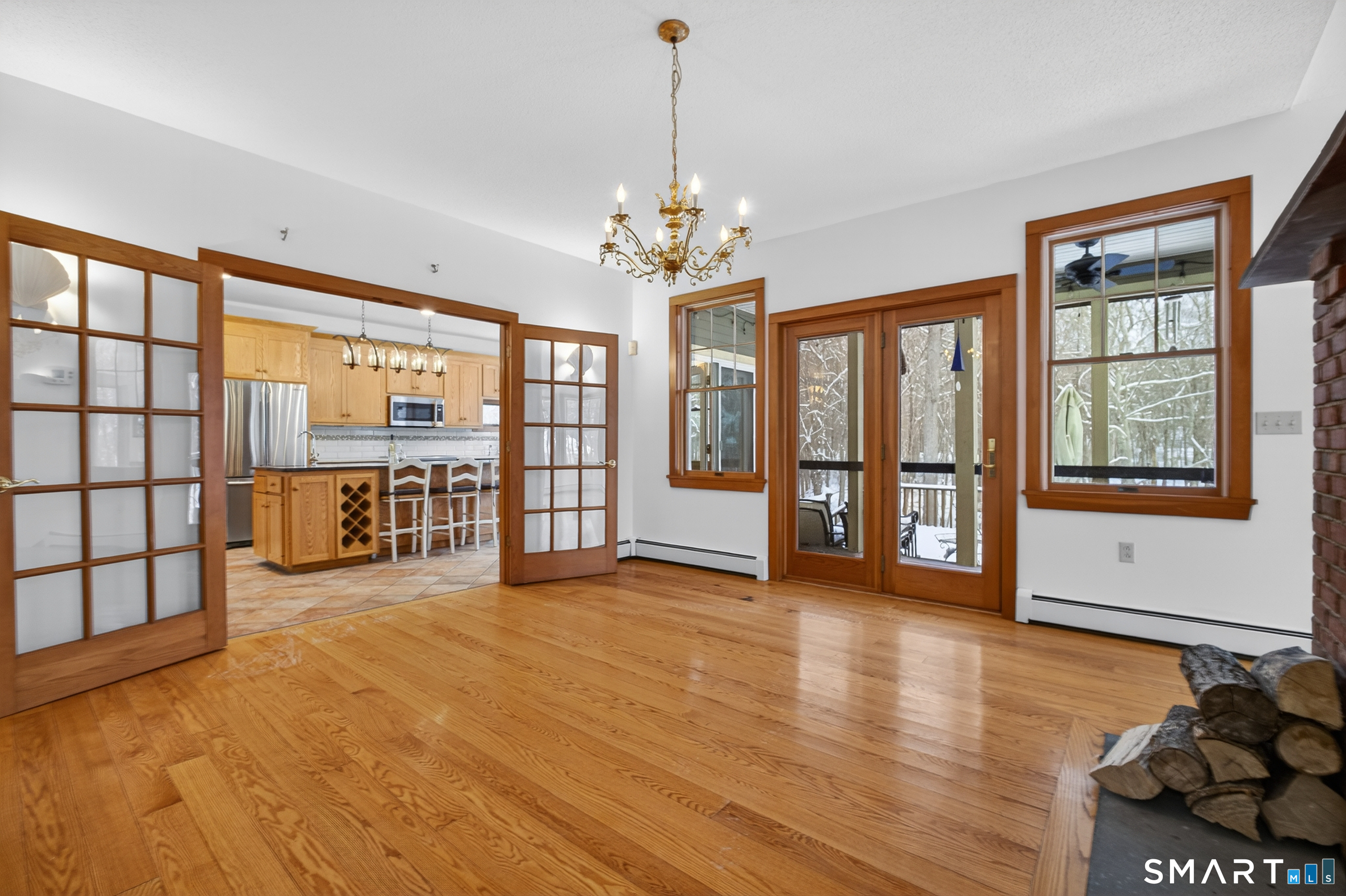 14 Cutler Road Old Lyme, CT 06371 - Photo 10 of 34 Dining room with French doors to the porch and to the Kitchen