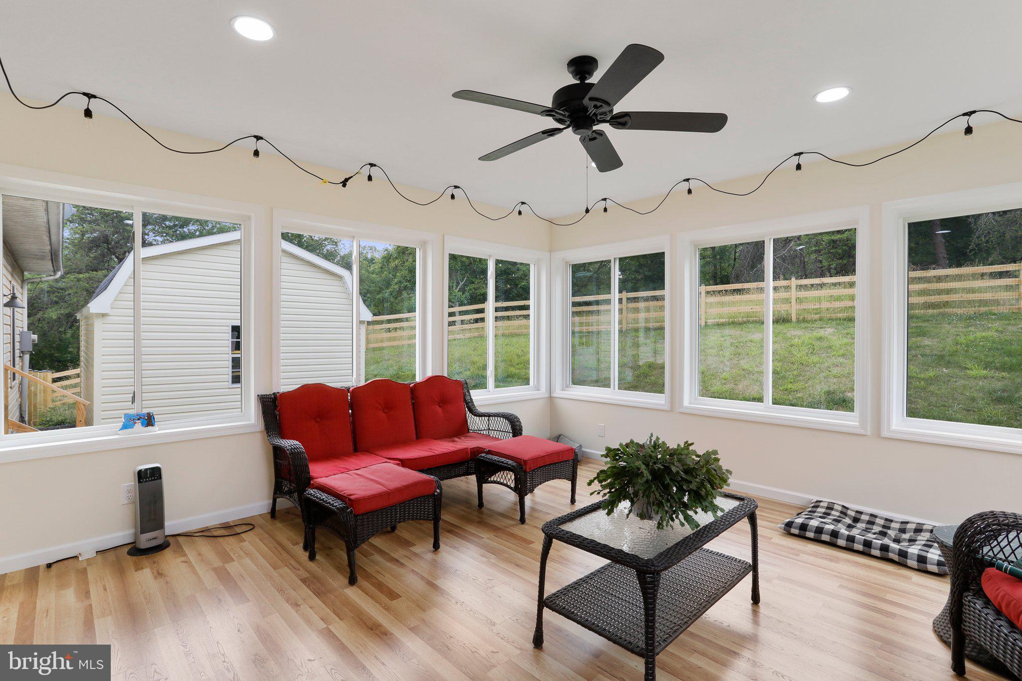 96 Woodbrier Road Berkeley Springs, WV 25411 - Photo 19 of 34 Added Sunroom