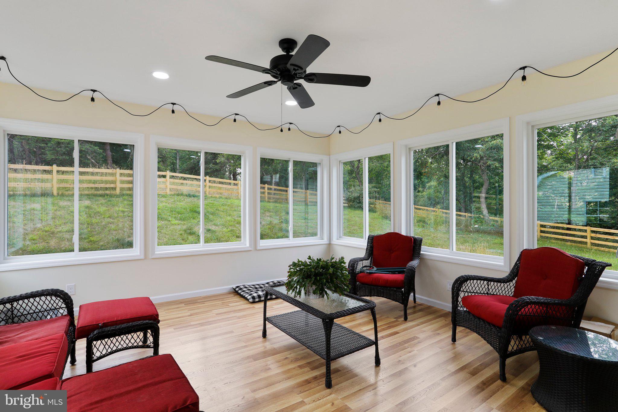 96 Woodbrier Road Berkeley Springs, WV 25411 - Photo 20 of 34 Added Sunroom