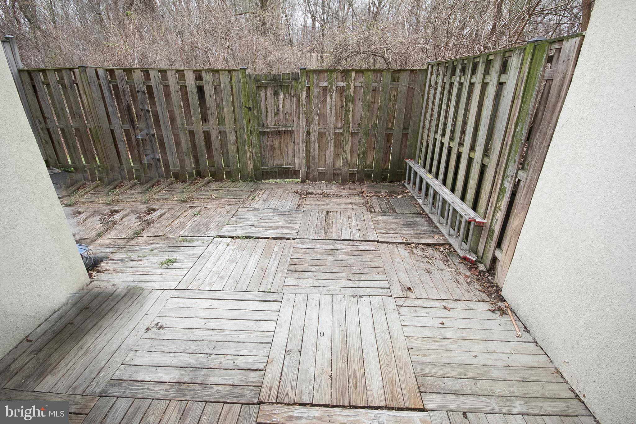 9734 Basket Ring Road Columbia, MD 21045 - Photo 24 of 26 Fence patio facing the woods