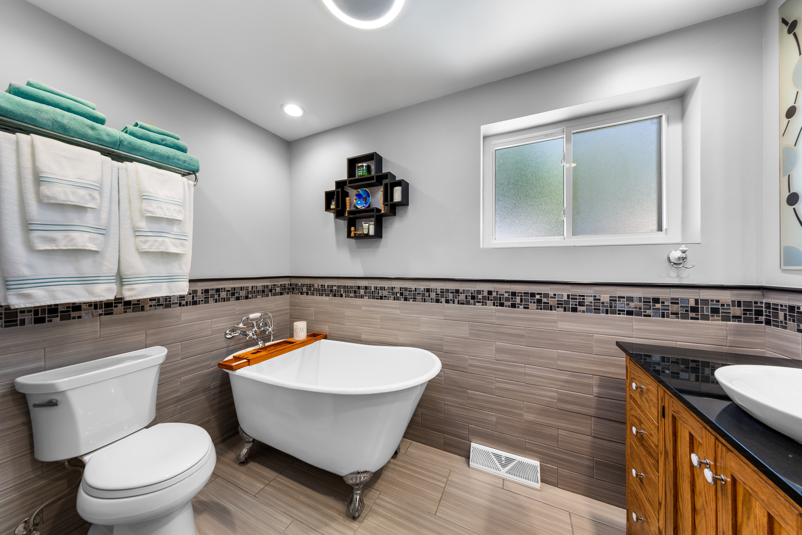 3700 South Normal Avenue Chicago, IL 60609 - Photo 16 of 36 a bathroom with a toilet sink and mirror
