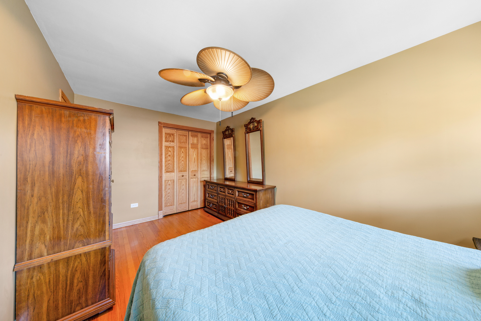 3700 South Normal Avenue Chicago, IL 60609 - Photo 18 of 36 a bedroom with a bed and a chandelier