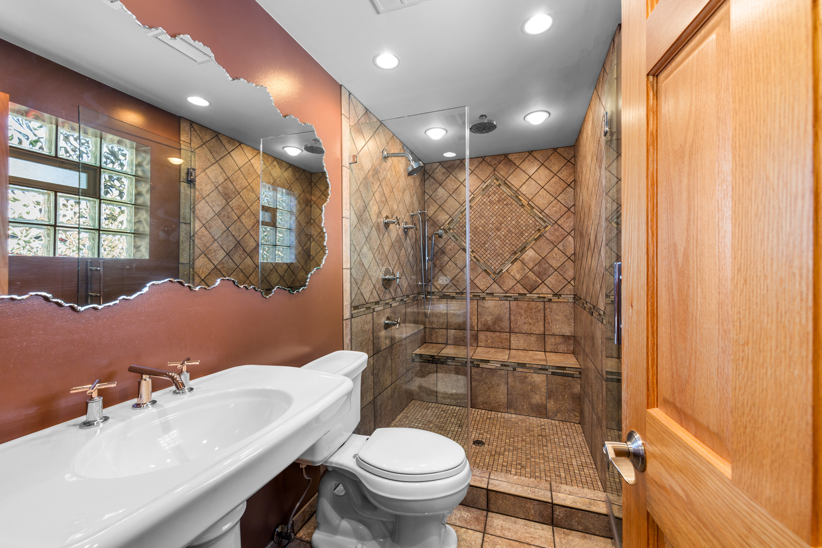 3700 South Normal Avenue Chicago, IL 60609 - Photo 19 of 36 a bathroom with a sink toilet mirror and shower
