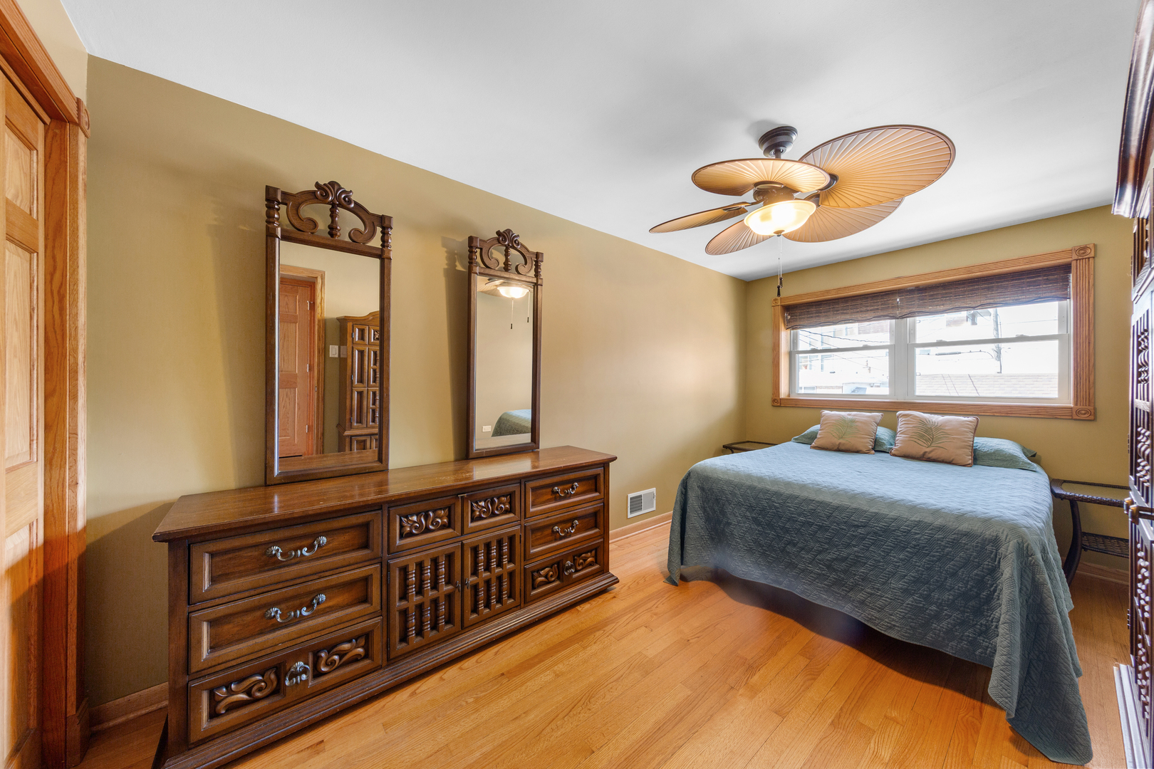 3700 South Normal Avenue Chicago, IL 60609 - Photo 20 of 36 a bedroom with a bed and a chandelier