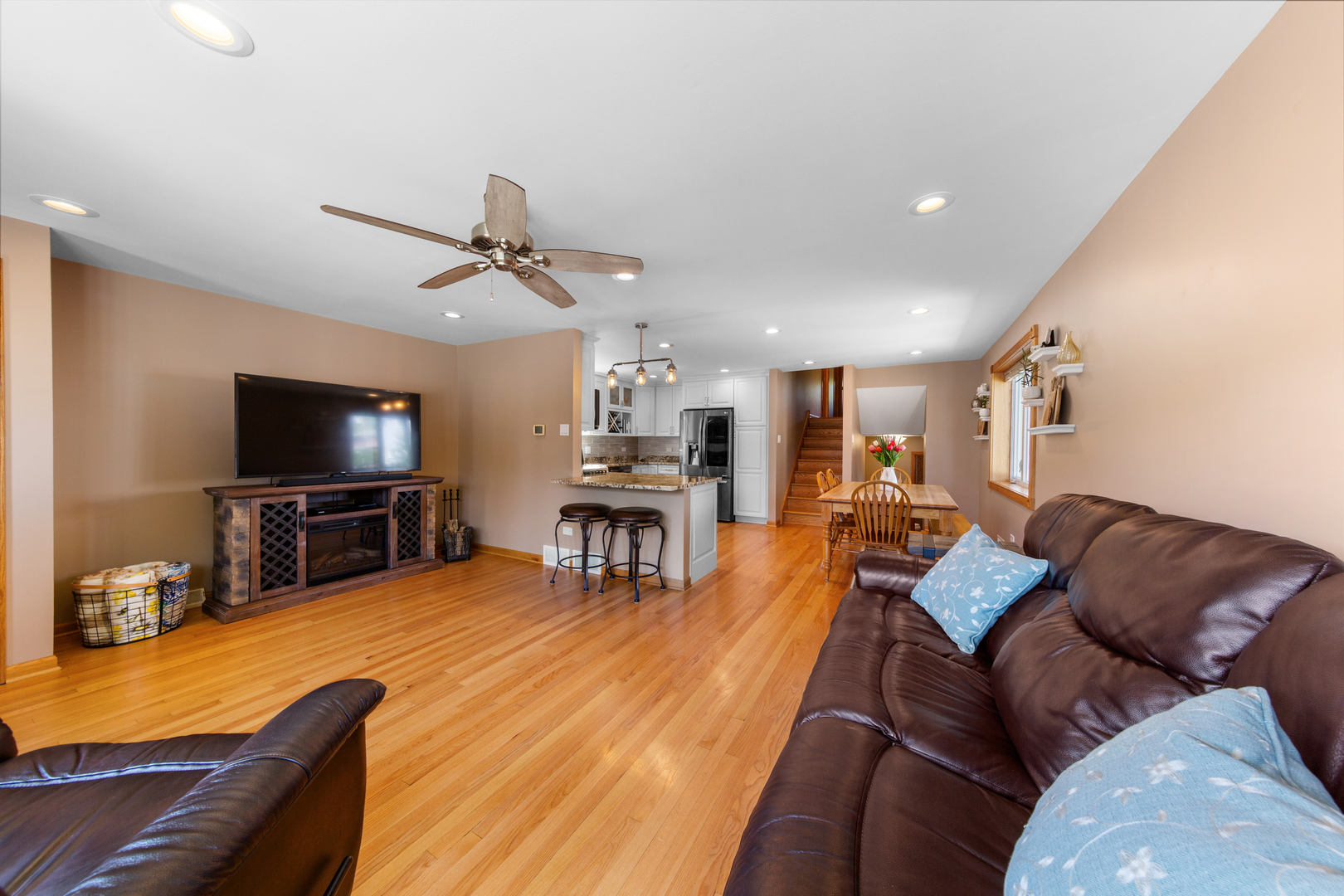 3700 South Normal Avenue Chicago, IL 60609 - Photo 2 of 36 a living room with furniture and a flat screen tv