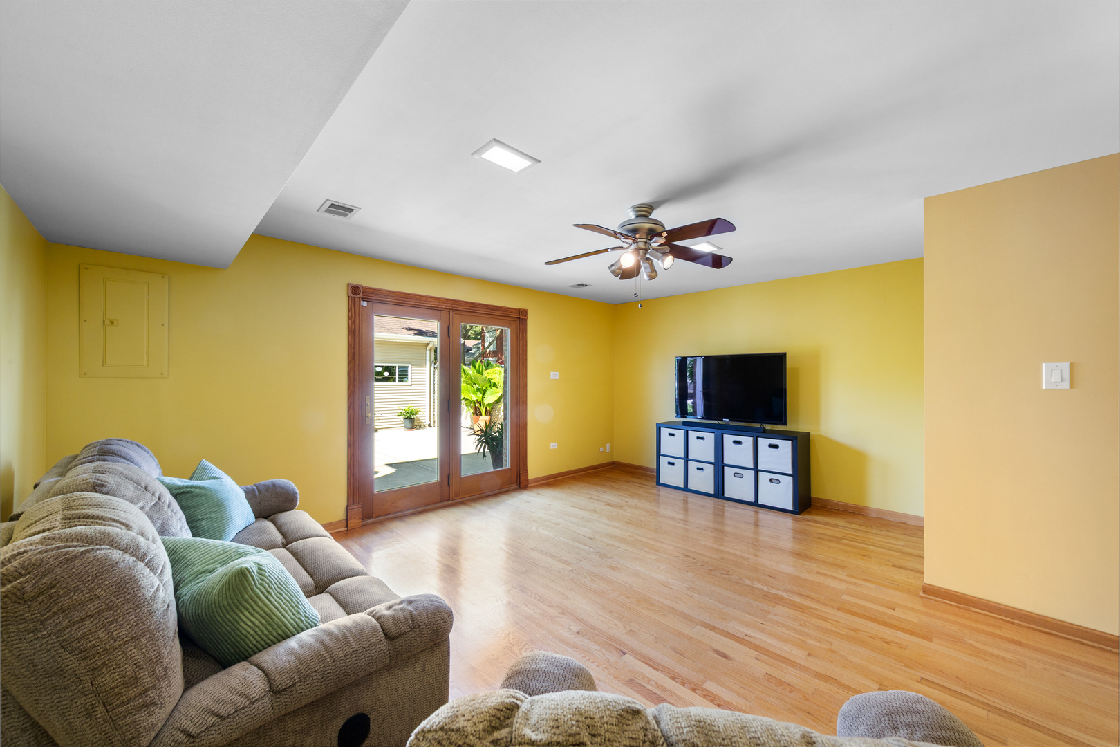 3700 South Normal Avenue Chicago, IL 60609 - Photo 23 of 36 a living room with furniture and a flat screen tv