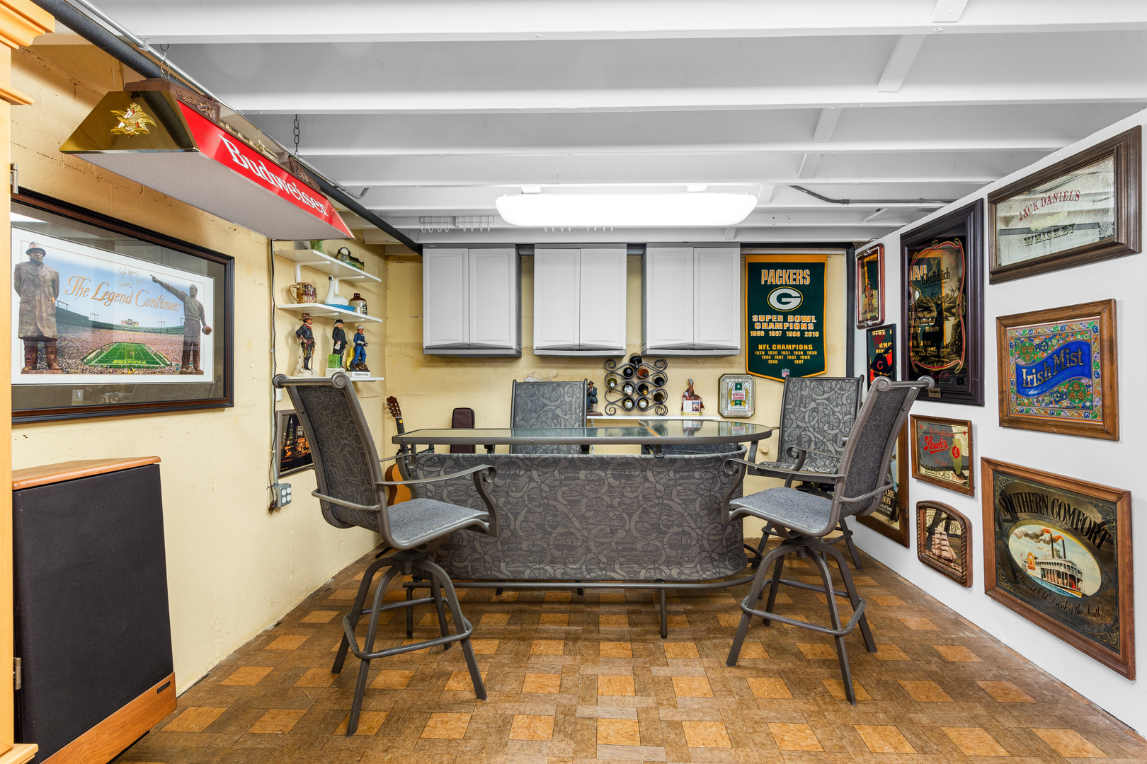 3700 South Normal Avenue Chicago, IL 60609 - Photo 26 of 36 a living room with furniture a flat screen tv and a floor to ceiling window