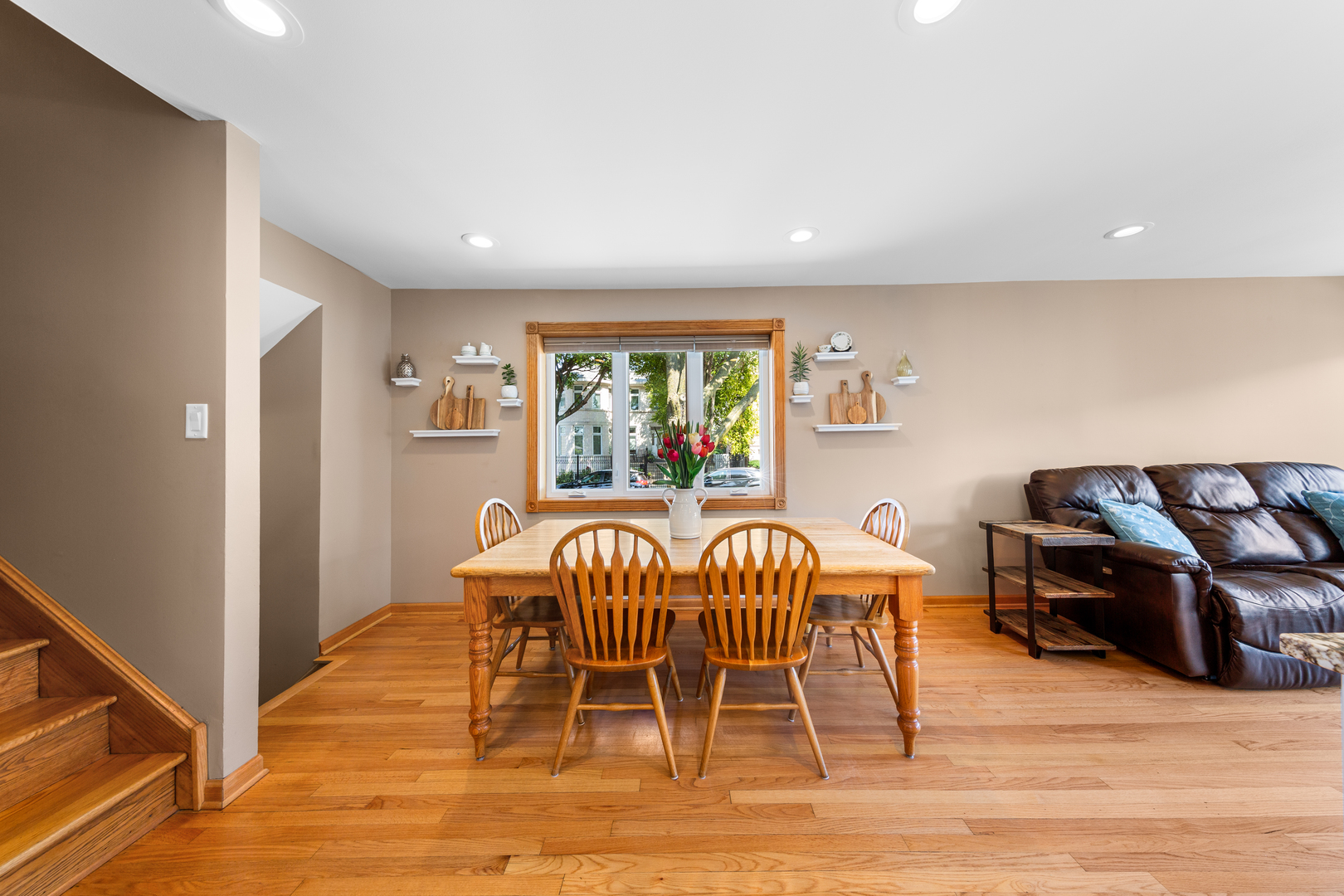 3700 South Normal Avenue Chicago, IL 60609 - Photo 6 of 36 a view of a dining room with furniture window and wooden floor