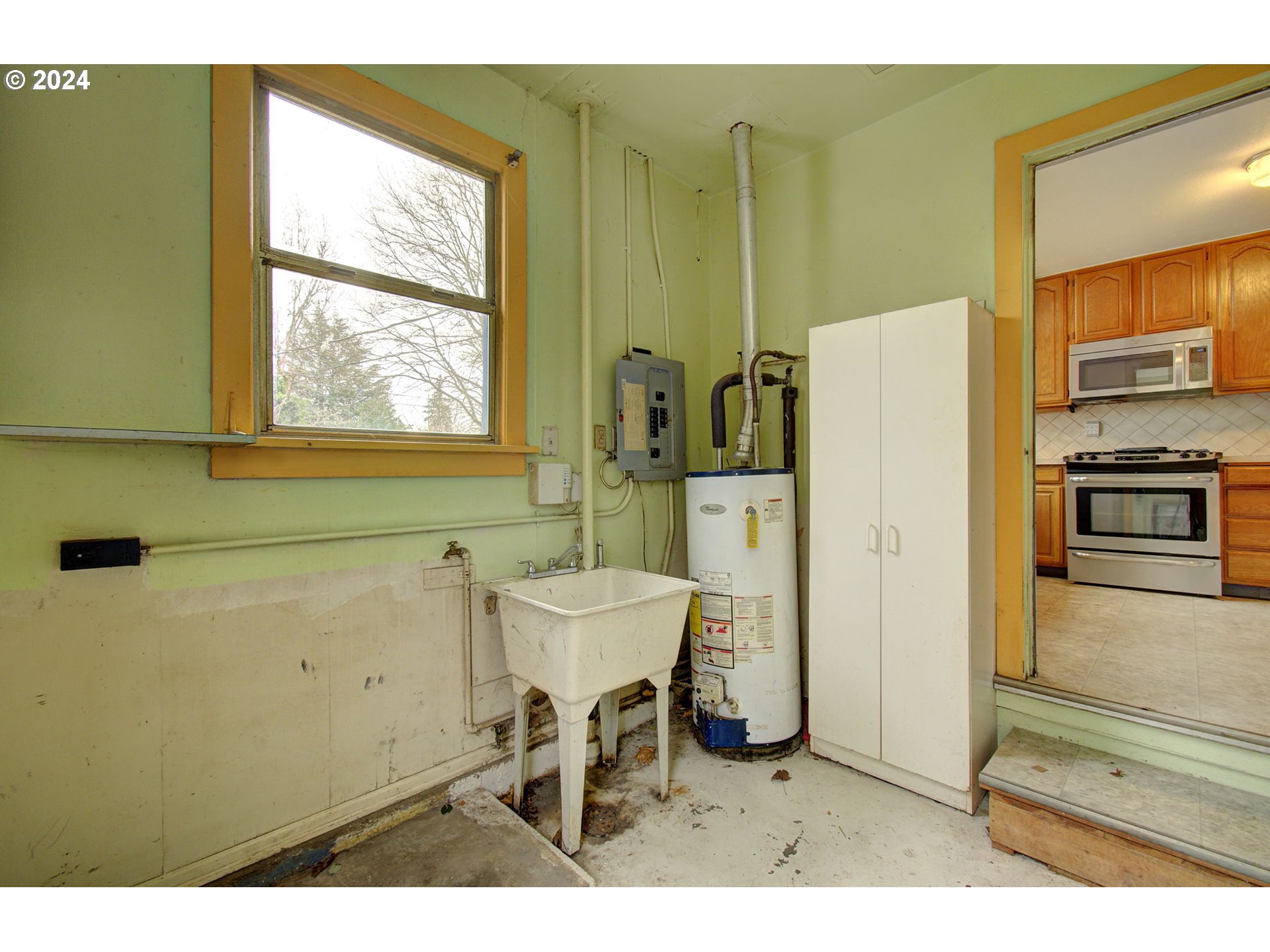 168 Southeast Whitney Street Camas, WA 98607 - Photo 11 of 32 a bathroom with a sink a mirror and a glass door shower