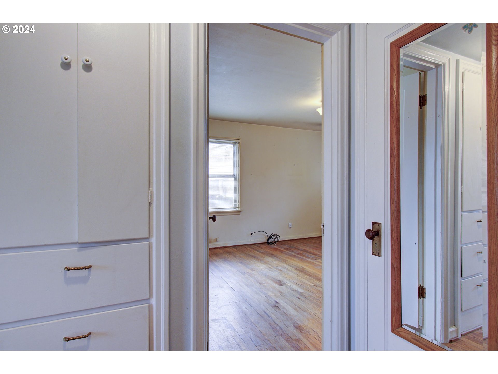 168 Southeast Whitney Street Camas, WA 98607 - Photo 14 of 32 a view of an empty room with wooden floor