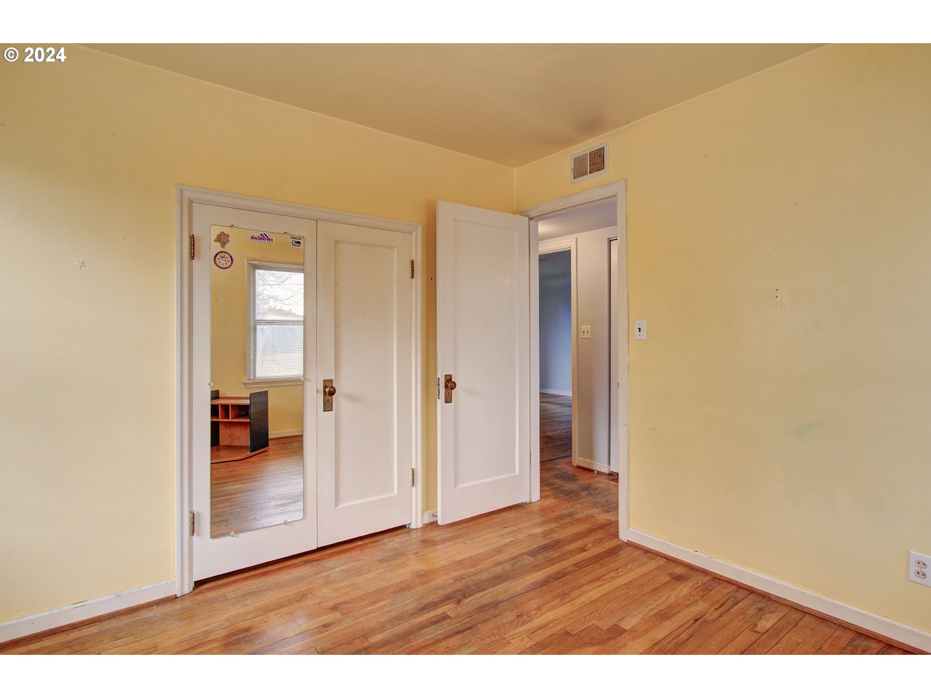168 Southeast Whitney Street Camas, WA 98607 - Photo 18 of 32 a view of a hallway with wooden floor