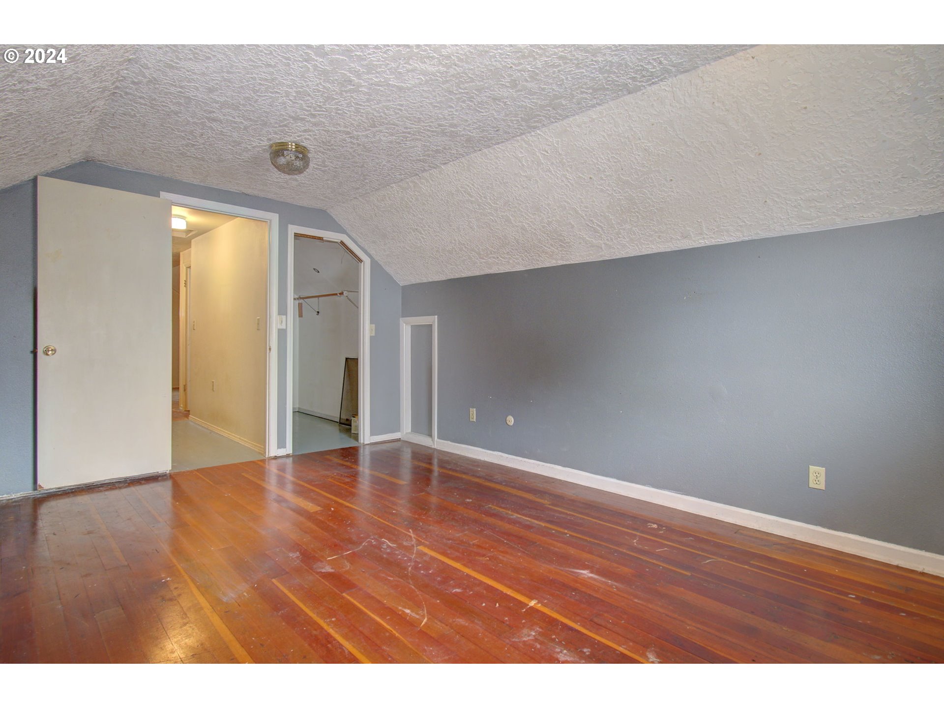 168 Southeast Whitney Street Camas, WA 98607 - Photo 25 of 32 a view of an empty room with wooden floor