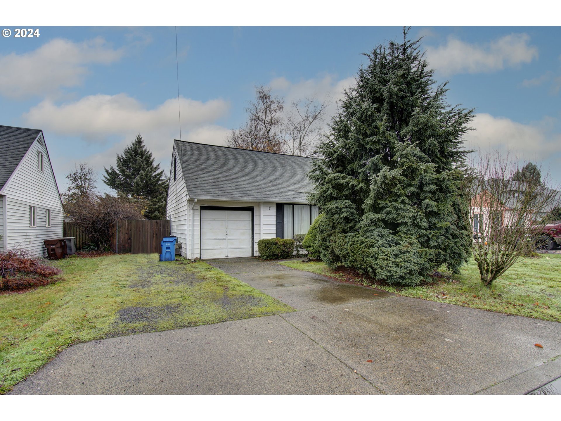 168 Southeast Whitney Street Camas, WA 98607 - Photo 3 of 32 a view of a house with a yard and garage