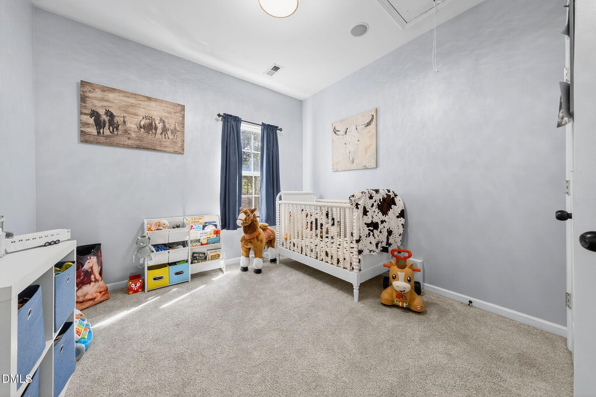 25 Hillside Village Drive Louisburg, NC 27549 - Photo 20 of 35 a view of a livingroom with toys