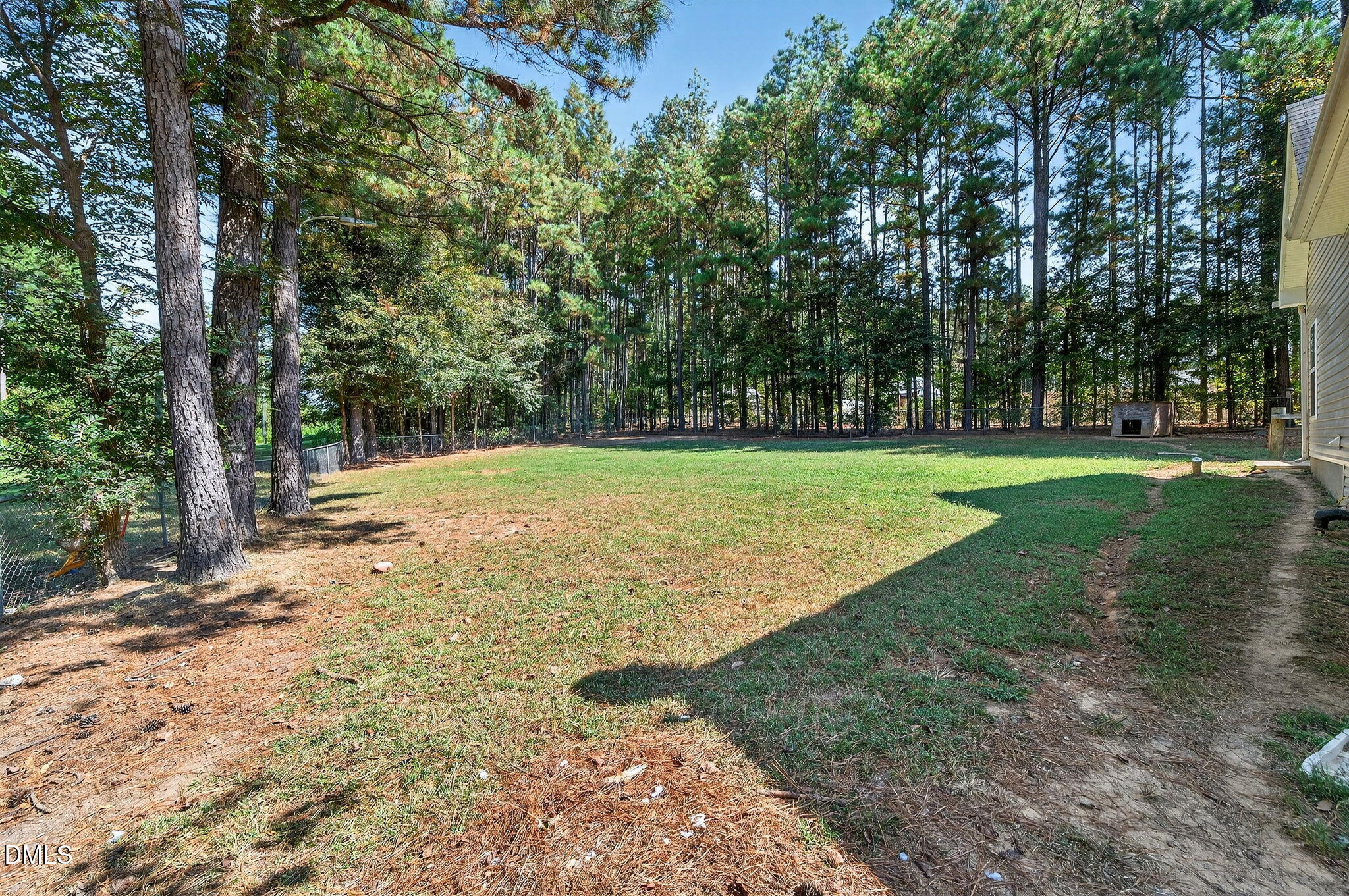 25 Hillside Village Drive Louisburg, NC 27549 - Photo 25 of 35 a view of a field with trees in the background