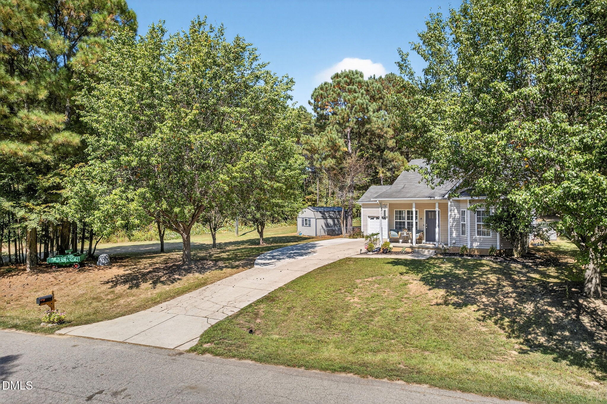 25 Hillside Village Drive Louisburg, NC 27549 - Photo 31 of 35 a view of a house with a yard