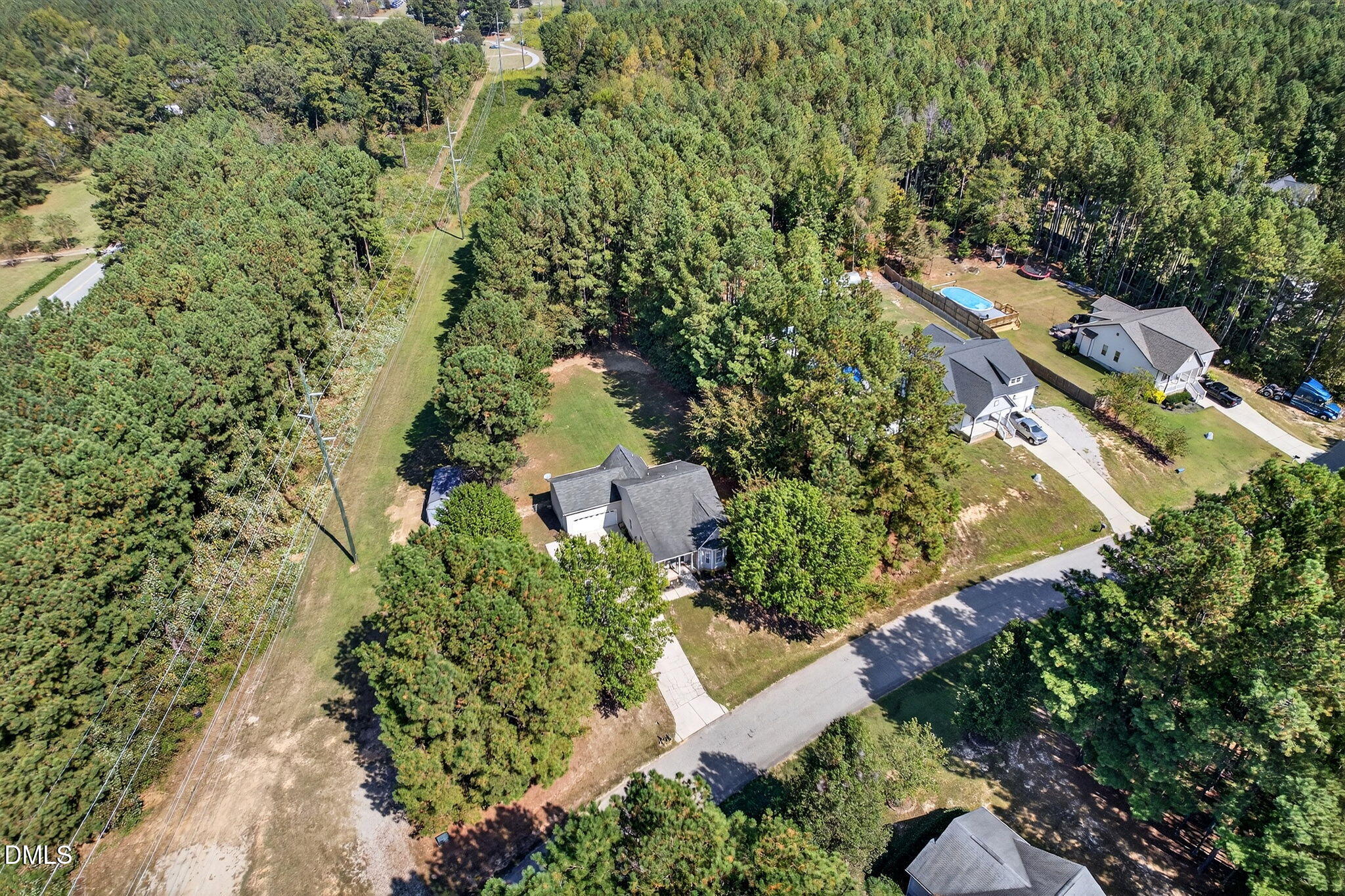 25 Hillside Village Drive Louisburg, NC 27549 - Photo 32 of 35 an aerial view of a house with a yard