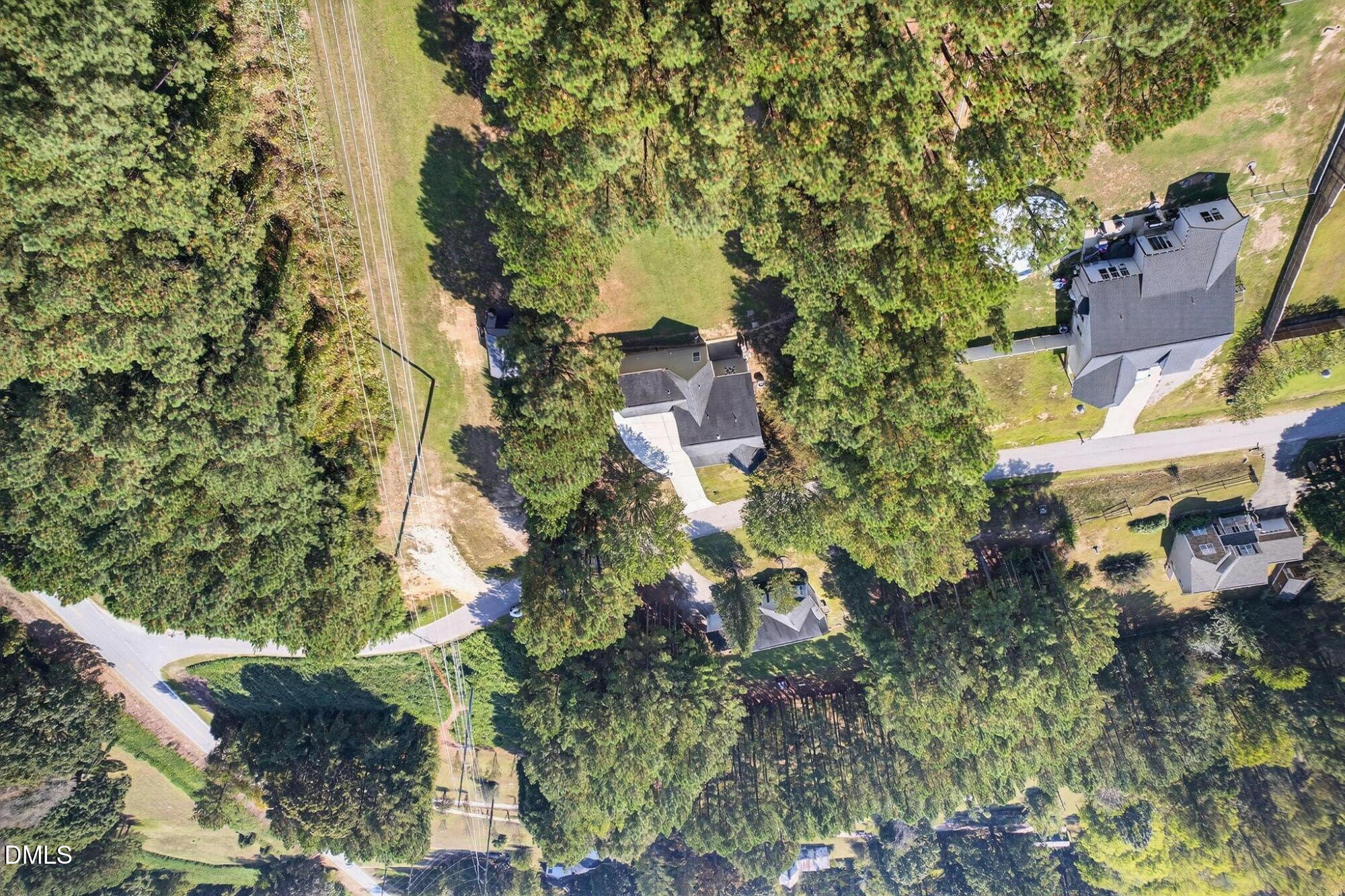 25 Hillside Village Drive Louisburg, NC 27549 - Photo 33 of 35 an aerial view of residential house with outdoor space and trees all around