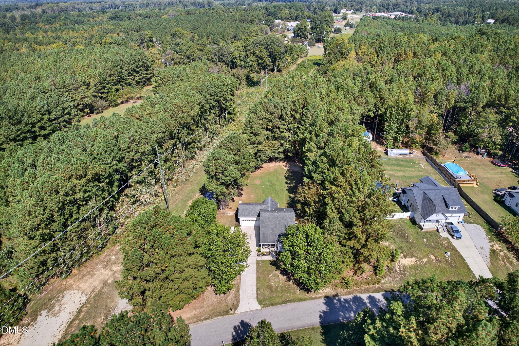 25 Hillside Village Drive Louisburg, NC 27549 - Photo 3 of 35 an aerial view of residential house with outdoor space and trees all around