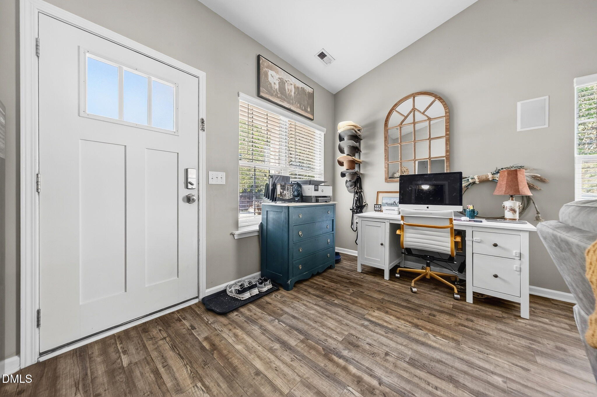 25 Hillside Village Drive Louisburg, NC 27549 - Photo 5 of 35 a view of a workspace with furniture and a window