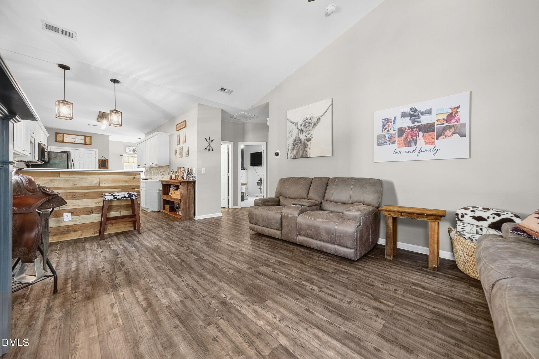 25 Hillside Village Drive Louisburg, NC 27549 - Photo 7 of 35 a living room with furniture and a fireplace