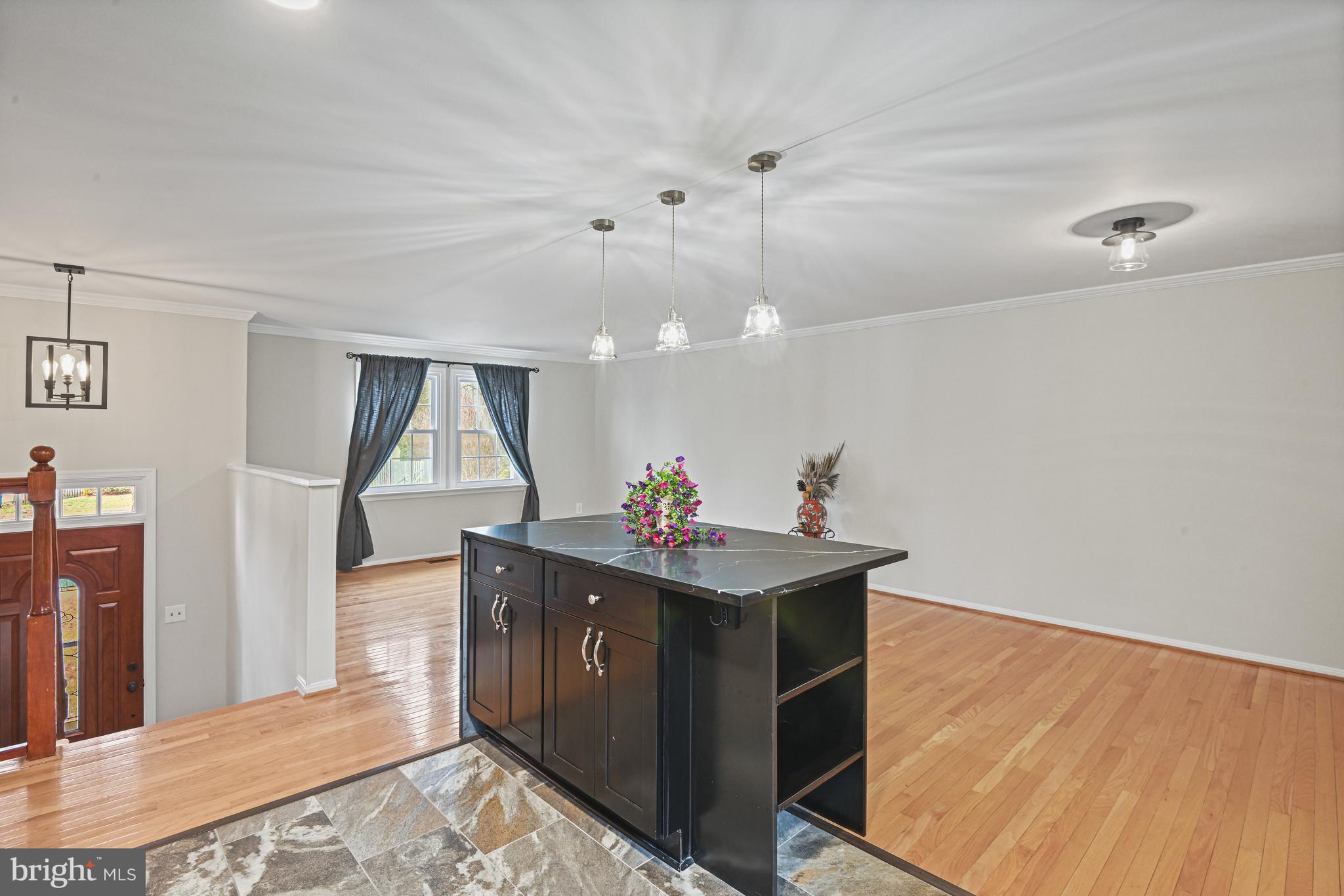 532 Merlins Lane Herndon, VA 20170 - Photo 13 of 42 a view of a living room and a wooden floor