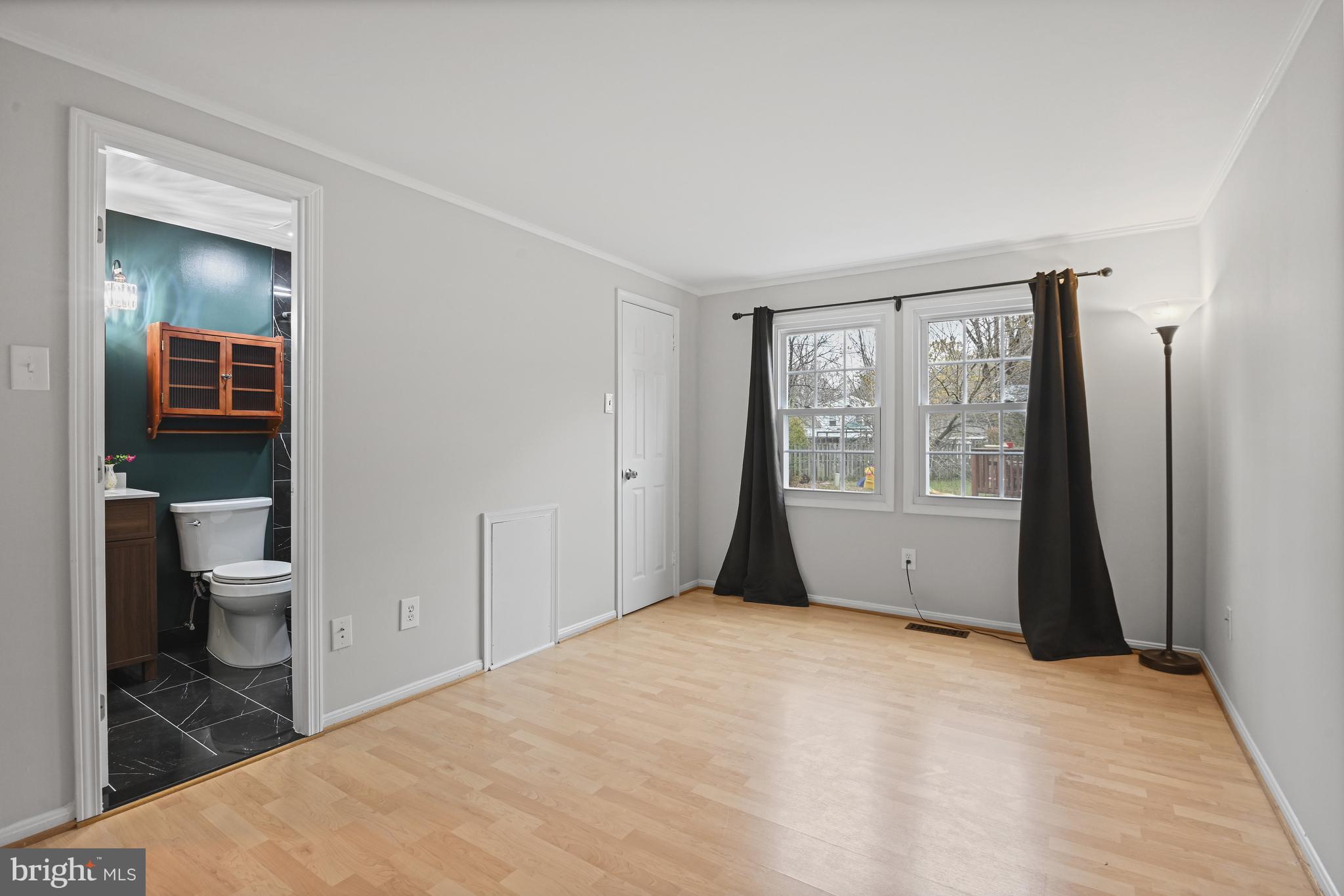 532 Merlins Lane Herndon, VA 20170 - Photo 19 of 42 a view of a room with a wardrobe space