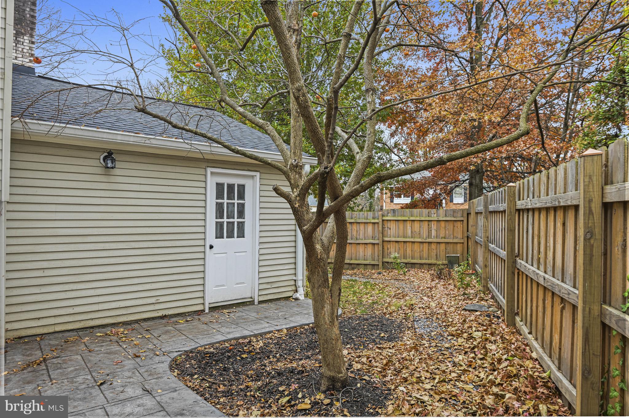 532 Merlins Lane Herndon, VA 20170 - Photo 40 of 42 a view of a backyard with a large tree