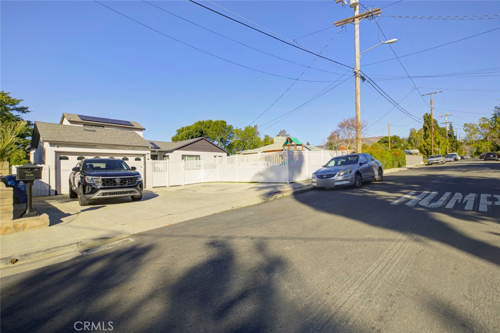 10317 Pinyon Avenue Tujunga, CA 91042 - Photo 2 of 41 a view of a street with cars
