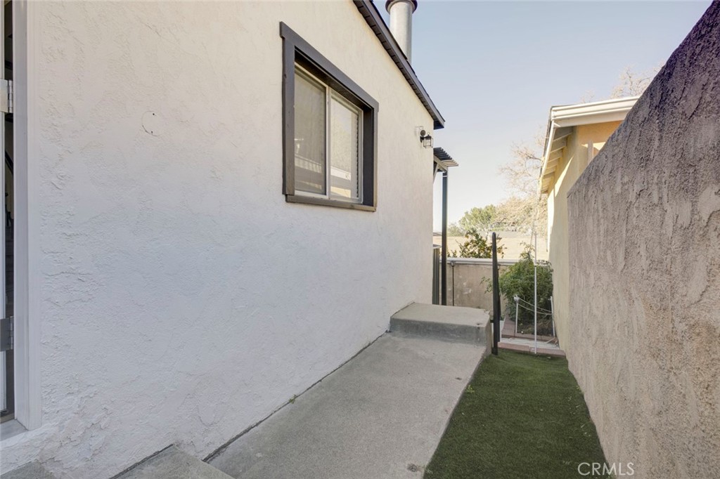 10317 Pinyon Avenue Tujunga, CA 91042 - Photo 30 of 41 a view of a hallway with windows