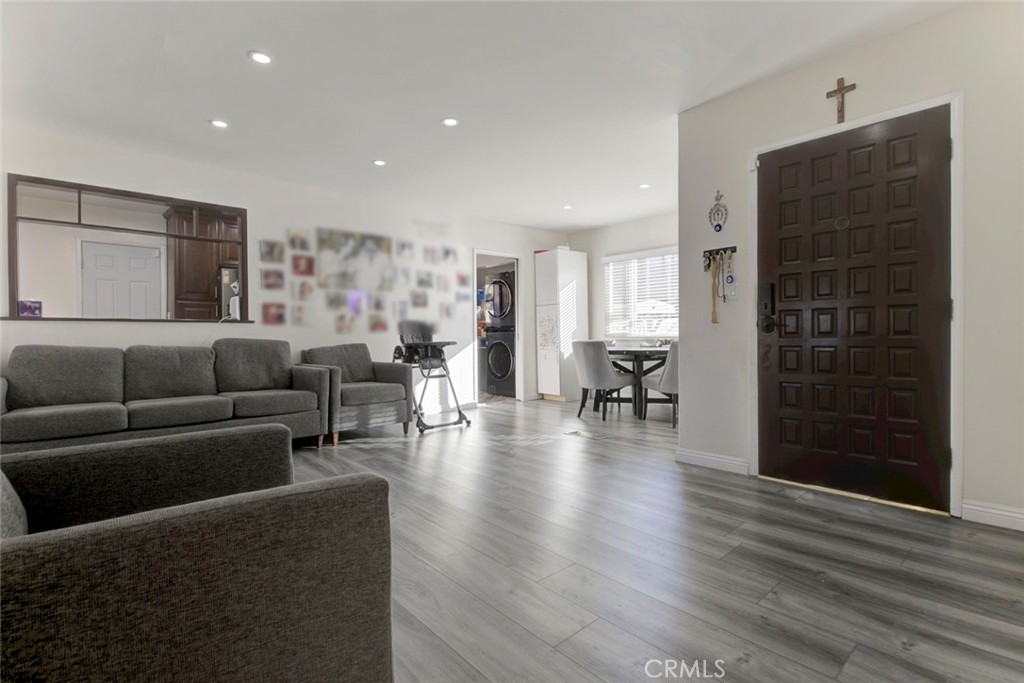 10317 Pinyon Avenue Tujunga, CA 91042 - Photo 4 of 41 a living room with furniture and wooden floor