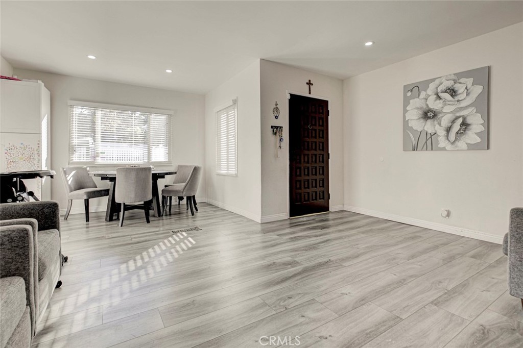 10317 Pinyon Avenue Tujunga, CA 91042 - Photo 7 of 41 a view of a livingroom with furniture and window